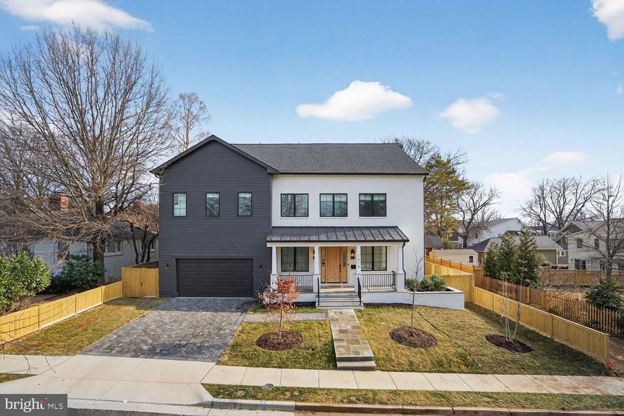 Thoughtfully designed, meticulously finished, and built without compromise, this modern colonial offers over 7,500 square feet across four expansive levels, with 6 bedrooms and 7.5 baths, in one of North Arlington’s most established neighborhoods.

The interiors balance architectural presence with everyday livability. A dramatic open-riser white oak staircase anchors the home, connecting spaces that feel both open and intentional. Wide-plank hardwood floors span three levels, complemented by custom hand-built cabinetry throughout the kitchen, wet bars, and all bathrooms. The chef’s kitchen is outfitted with Sub-Zero and Wolf appliances, designed for real use, not just show.

The second level features five spacious ensuite bedrooms, each with a walk-in closet, offering a rare combination of scale and privacy. The vaulted top floor serves as a true flex space, ideal as a private retreat, office, bonus playroom, or an additional living level. It includes a full bath, wet bar, generous storage, and access to a private rooftop deck with treetop views.

The day lit walk-out lower level, with its own entrance, is well suited for guests, an au pair, or multi-generational living.

Built for longevity and comfort, 1615 N. Wakefield features solid 2x6 framing, brick and cement exterior construction, premium Pella windows, three-zone HVAC, and dual oversized tankless water heaters.

Set on a quiet, tree-lined street in the heart of North Arlington (22207), the location offers both calm and convenience: 0.9 miles to Ballston Metro and shops, 0.6 miles to the Langston Blvd retail corridor, and 0.6 miles to Virginia Hospital Center.

This isn’t a copy-paste build. It’s a statement of intent. Every choice, from materials to layout, was made to impress today and endure tomorrow.