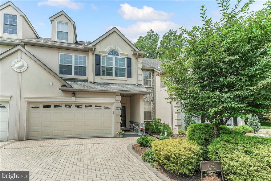 Located in the prestigious and highly desirable community of The Woods at Wayne, this beautifully upgraded 3 bedroom, 3.5 bathroom townhome offers sophisticated living with an abundance of natural light, high-end finishes, and a seamless flow (indoor and outdoor) that’s perfect for entertaining or living simply.

Approach the home to a manicured front entry defined by stone pavers across the double garage door, surrounded by lush perennials. Step inside to gleaming hardwood floors, and a thoughtful open floorplan that effortlessly connects the sunlit living room—complete with a cozy gas fireplace—to the remodeled gourmet kitchen and extended private deck. The stunning kitchen features black granite countertops, stainless steel appliances, double ovens, skylights, and custom pull-out cabinetry, all designed for both functionality and style. A spacious eat-in area makes casual dining a delight, while the updated powder room on the main floor adds extra convenience. Step outside to the extended private deck featuring a built-in gas BBQ—perfect for gatherings in a tranquil setting. Enjoy a stylish, updated, move-in-ready home designed for low-maintenance living. A 2-car garage provides ample parking and storage with inside access to the main level.

Upstairs, retreat to the primary suite complete with vaulted ceilings, a luxurious spa-inspired bathroom with cathedral ceilings, an oversized soaking tub, upgraded fixtures, double sinks, and ample storage space in the custom closets, including a walk-in. Two additional bedrooms are located on this floor both including vaulted ceilings and excellent closets. A full hall bath is also located on this level, along with a convenient laundry room. The third floor offers a versatile oversized loft bathed in natural light through a large window—ideal for use as a bedroom, home office, creative space, or storage space. 

The finished lower level expands your living space even further with over 10 foot ceilings, a full bathroom, a flexible layout, and is ready to accommodate a guest suite, playroom, or home office. Also, there is an enormous walk-in storage pantry on this level with a sink and many other closets for even more storage space. Additionally, enjoy the convenience of walkout access from the lower level to the backyard. 
Ideally located just minutes from downtown Wayne, King of Prussia Mall, Wegmans, local restaurants,  major highways, and shopping galore, this exceptional property offers comfort, space, and convenience in one of the area’s most desirable neighborhoods.

Don’t miss your chance to make this beautifully appointed home your own!