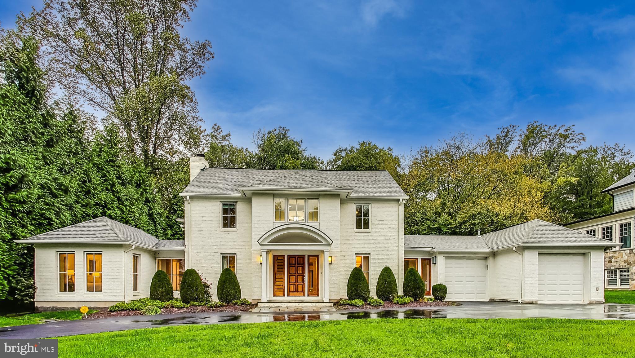 This exquisite and expanded Colonial residence offers an unparalleled lifestyle with designer finishes and prime location-walking distance to Potomac Elementary as well as the vibrant Potomac Village, where an array of shops, restaurants, and local entertainment awaits.
As you step inside, you’ll be captivated by the grand entryway and the beautiful hardwood floors that grace both the main and upper levels, adding warmth and elegance to every room. The center hall design enhances the welcoming atmosphere, providing a seamless flow that connects the living spaces, making it perfect for both everyday living and entertaining.
This home boasts five spacious bedrooms and four-and-a-half elegantly appointed bathrooms, all meticulously updated and designed by the renowned Ann Sacks Design Studios. The expansive main level features a formal living room adorned with tasteful crown molding and wood burning fireplace, where you can host gatherings or enjoy quiet evenings with family. The dining room is defined by a custom trimmed accent wall and designer chandelier fixture that compliments the ambiance of the space.
The heart of the home is undoubtedly the gourmet kitchen, which exudes sophistication with its stunning marble countertops, a complete Sub-Zero appliance suite, and a top-of-the-line 6 burner Wolf cooktop package. The industrial hood adds a welcomed touch, while the expansive layout provides ample space for culinary creativity. The open concept design encourages gathering between the kitchen, large family room and informal dining space with vaulted ceilings. The family room with gas fireplace and marble surround, tray ceiling and recessed lighting features floor to ceiling windows and french doors overlooking the flagstone patio, firepit and private rear yard brings harmonious blend to the living area. Adjacent to the kitchen, the large mudroom area not only offers practical storage solutions but also serves as a perfect space for coming and going, making entertaining and family organization a breeze.
A versatile main-level bedroom suite presents an opportunity for visiting guests, aging family members or can easily function as a home office with tasteful built ins, catering to your lifestyle needs. The main level full bathroom was thoughtfully designed and boasts herringbone limestone flooring, Grohe fixtures, Toto toilet and designer light fixtures.
Venture upstairs to find four spacious bedrooms including the primary suite plus a large, versatile den space with a massive picture window overlooking the serene rear yard and green space. Each room thoughtfully designed to offer comfort and tranquility, ensuring that every family member has their own private retreat. The primary suite offers his and her walk in closets with Elfa design systems, large dual vanity with luxurious limestone capped counters, Grohe plumbing fixtures including an indulgent rain shower and jetted soaking tub and designer lighting additions designed to captivate.
The finished basement expands your living space even further, featuring a large recreation room where family and friends can gather for movie nights or game days, along with a convenient powder room for guests along with another guest bedroom or gym space with egress window.
Completing this magnificent home is a three-car garage with electric charging port, providing the perfect blend of convenience and storage.
With its superb craftsmanship, elegant design elements, and prime location near top schools and local amenities, 10204 Gary Road is more than just a home—it's an extraordinary opportunity to embrace the Potomac lifestyle. Don’t miss the chance to make this remarkable property your own. Welcome Home!