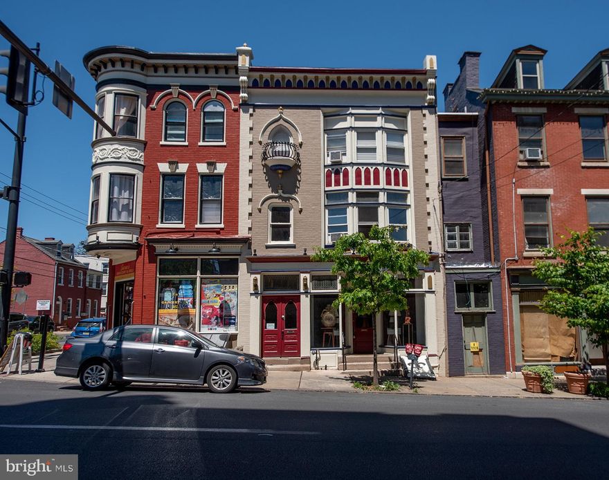 Welcome to 257 W King Street—a rare historic gem in Lancaster City's Downtown Business District! One of only three remaining commercial buildings in the city showcasing the striking Second Gothic Revival architectural style. With an exquisitely preserved, richly ornate brick façade dating back to circa 1890, this iconic structure once belonged to prominent jeweler and developer Henry Zahm Rhoades and later served the community through generations of retail and residential uses.  This mixed use residential/commercial property is Airbnb approved.
Today, this beautiful property offers endless possibilities with a first-floor commercial space perfect for a boutique, gallery, café, nail salon or office, plus two residential units above—a large 3-bedroom apartment spanning the second and third floors, and a charming renovated studio with private backyard. Whether you're looking to live and work in the same building or invest in a unique income-producing property in Downtown Lancaster, you won't want to miss this opportunity! 
Conveniently located in the Central Business District in Downtown Lancaster, you're just steps away from Central Market, restaurants, coffee shops, galleries, the Convention Center, and more. Plus, the property sits within the City Revitalization & Improvement Zone (CRIZ), which may offer financial incentives and grants  for acquisition, renovation, and business growth. 
Historic charm, modern opportunity. Schedule your private tour today—properties like this don’t come around often!