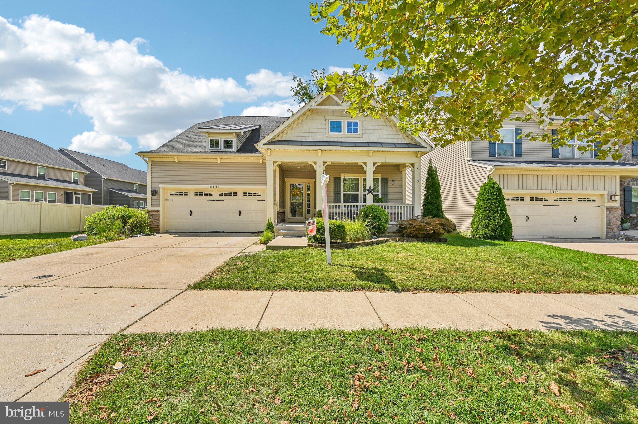 819 Creekside Village Blvd in Glen Burnie offers the space, features, and location you’ve been looking for. This wonderful home boasts 4 bedrooms and 4 full baths, a main level office/den, and an attached 2-car garage, plus a covered front porch that welcomes you inside. Hardwood floors run throughout the main level, where you’ll find a cozy stone fireplace and a well-designed kitchen with stainless steel appliances, wood cabinets, granite countertops, subway tile backsplash, recessed lighting, and an island with breakfast bar seating. The main level laundry adds extra convenience. The primary bedroom is generously sized with its own bathroom and direct access to the back deck. The generously sized finished basement with a wet bar is the perfect space for entertaining. Enjoy being close to the Creekside Village clubhouse, pool, and gym, and just minutes from BWI Airport. NO FRONT FOOT FEE!