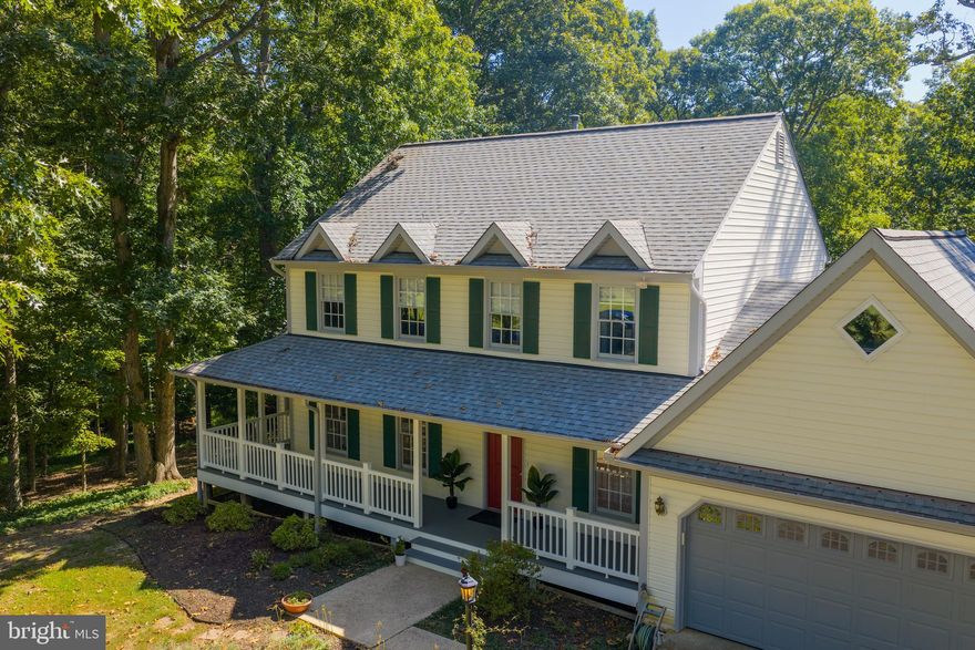 **** Seller offering$10,000 credit at closing. Use it for closing costs, decoration allowance or to buy down your mortgage points! **** This lovely colonial home is nestled in a peaceful wooded neighborhood with easy access to Route 3 and Fredericksburg. Enter the home through a welcoming foyer that opens up  to the living room,  a  light -filled sun room, and a  formal dining  room just right for meals with  your guests. The kitchen has  new stainless steel appliances with lots of room for creating delectable  dishes. The kitchen is open  to a nice breakfast nook and warm  family room. Upstairs you'll find a spacious primary suite and three other sizable bedrooms and a hall bath. A large walk-out basement includes a very long entertainment room with fireplace, an exercise room, a full bath and a mud-room to transition inside from the back yard. That back yard is the height of serenity where you can enjoy a variety of birds, deer and other wildlife, garden to your hearts desire or simply sit on your spacious composite deck and enjoy the peace. All this is within just a few minutes to downtown Fredericksburg, historic Chancellorsville and the mighty Rappahannock River. Come and see this beautiful home!