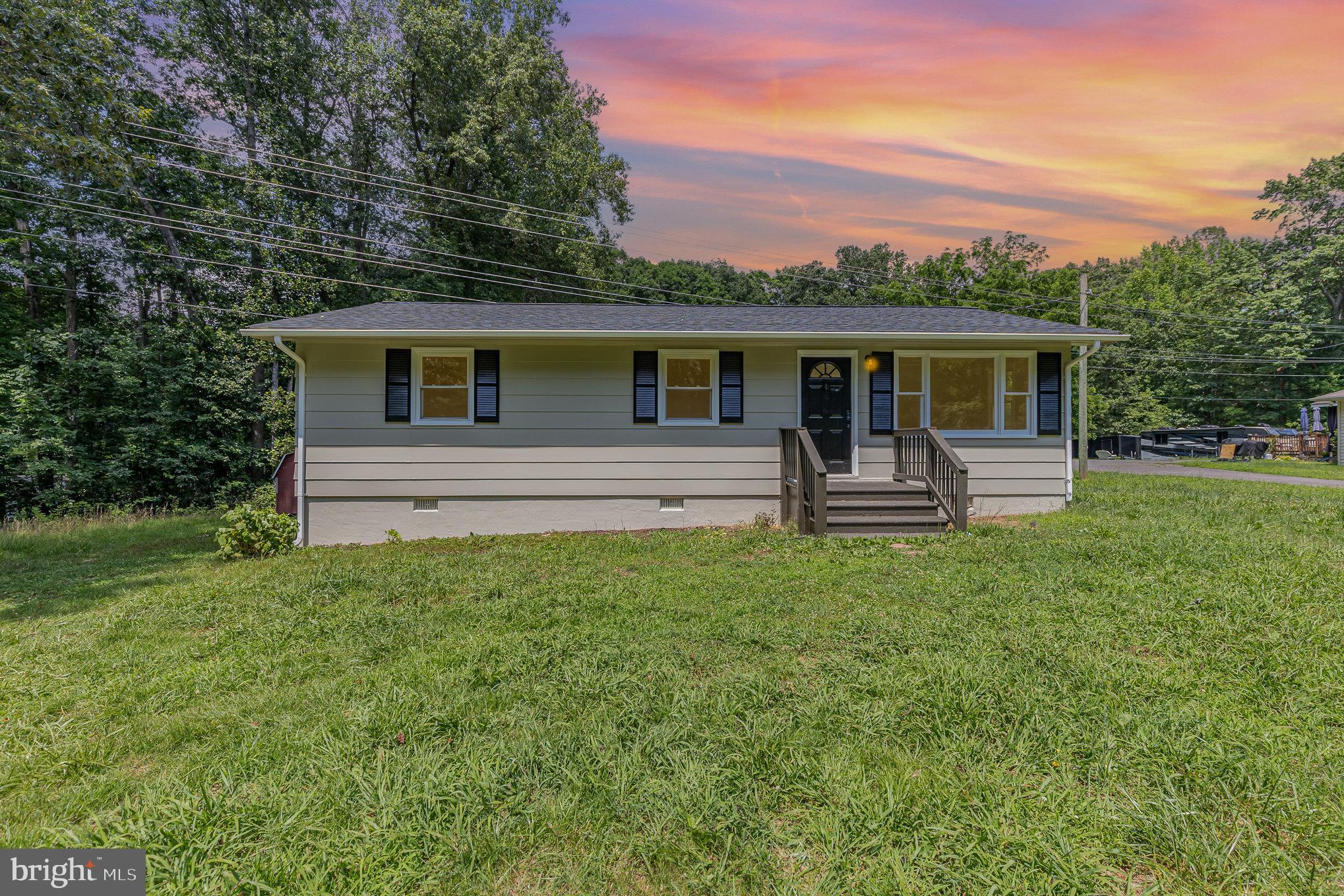 Price Improved!! Welcome to this beautifully renovated 3-bedroom, 1-bath, 1,008 sq ft home, perfectly situated on a spacious 1.23-acre lot with serene wooded views. Every detail has been thoughtfully updated to provide modern comfort and style.
This home features a brand-new roof (2025), new HVAC system (2025), new water heater (2024), new well tank (2024), and new distribution box (2024) for added peace of mind. Inside, you'll find new LVP flooring, fresh paint throughout, and a stunning expanded kitchen with brand-new cabinets, stainless steel appliances, and ample counter space – a true showstopper for anyone who loves to cook or entertain.
Enjoy the separate living room with recessed lighting, plus a combined kitchen and dining area perfect for everyday living. The home offers three spacious bedrooms and an updated full bathroom with modern finishes.
Step outside to a large deck, ideal for entertaining or simply relaxing while enjoying the private, wooded backdrop. A storage shed on the property adds extra convenience.
Prime locations nearby: Lake Anna – 10 miles: Enjoy boating, fishing, beaches, and scenic views
Lake Anna State Park – Hiking, swimming, nature programs & trails just a short drive away
Kalahari Resorts & Waterpark (Coming Soon) – 14 miles: A massive indoor/outdoor family resort and entertainment complex.
Downtown Fredericksburg – 14 miles: Historic charm, boutique shopping, local dining, museums, and a scenic riverfront
Lake Anna Winery – Enjoy tastings and weekend events just minutes away.
Civil War Battlefields – Explore Spotsylvania, Chancellorsville & Wilderness battlefield parks.
Wilderness Run Vineyards & 1781 Brewing Co. – Farm-based winery & brewery with live music and outdoor space.
This move-in-ready gem has it all – space, updates, and style. Don’t miss your chance to own this incredible home!