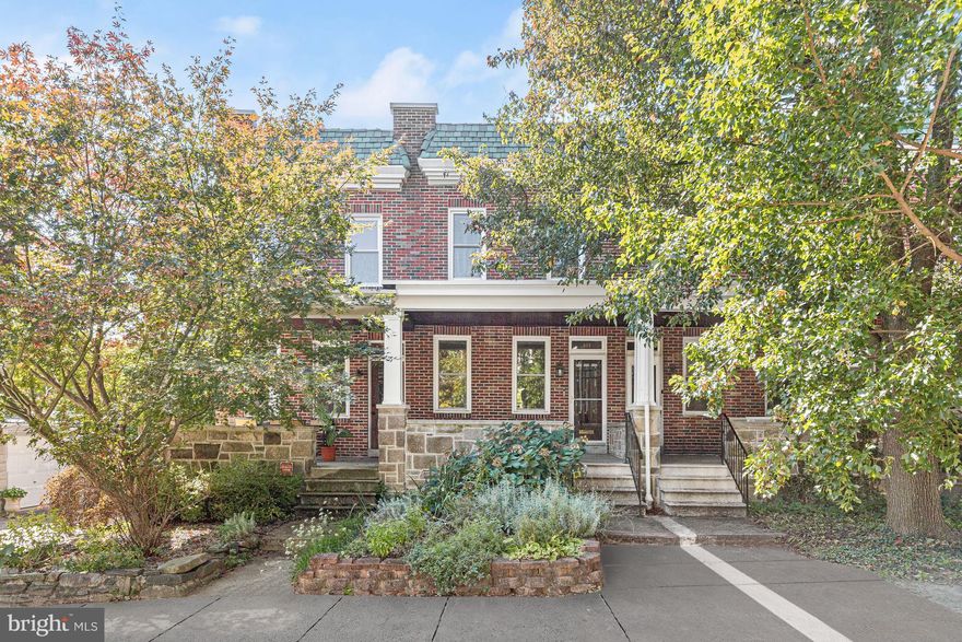 You asked and we did it! Newly refinished hardwood floors through out entire home!! Sanded & stained with a rich "Provincial" stain!  New lighting in dining & living rooms too! Don't miss out on this gem in  Baltimore's highly sought-after Wyman Park neighborhood. This stunning north-facing, brick exterior townhouse is the perfect combination of modern luxury and classic charm. This home has everything from the inviting front porch to the architectural details found throughout.  As you step inside, you'll be greeted by a spacious living room adorned with hardwood floors that flow seamlessly into the formal dining room. The living room also features a cozy gas-burning fireplace with a traditional brick surround and mantle, perfect for enjoying a quiet evening. The dining room boasts decorative sconces, creating an elegant atmosphere for entertaining guests.  The gourmet kitchen boasts a decorative backsplash, ceramic tile flooring, granite counters,  and 42"  soft close cabinetry with under lighting . Cooking and entertaining have never been easier. The updated bathroom features a luxurious jetted walk-in shower/tub and marble-inspired tile, offering a spa-like retreat right at home.  The upper-level houses three spacious bedrooms, all with ample storage. The lower level provides additional storage space, laundry area and powder room. Attached, one car garage and driveway for 2+ cars makes parking a breeze! Recent improvements include  gas hot water heater, split unit system for air conditioning,  gas boiler, hall bath and Pella windows/doors through out.  Close to the beautiful green spaces of Wyman Park, John Hopkins University, Baltimore Museum of Art and many of the retail shops and restaurants in Hamden. With its timeless charm and modern updates, this lovely townhome offers everything you need to live your best life.