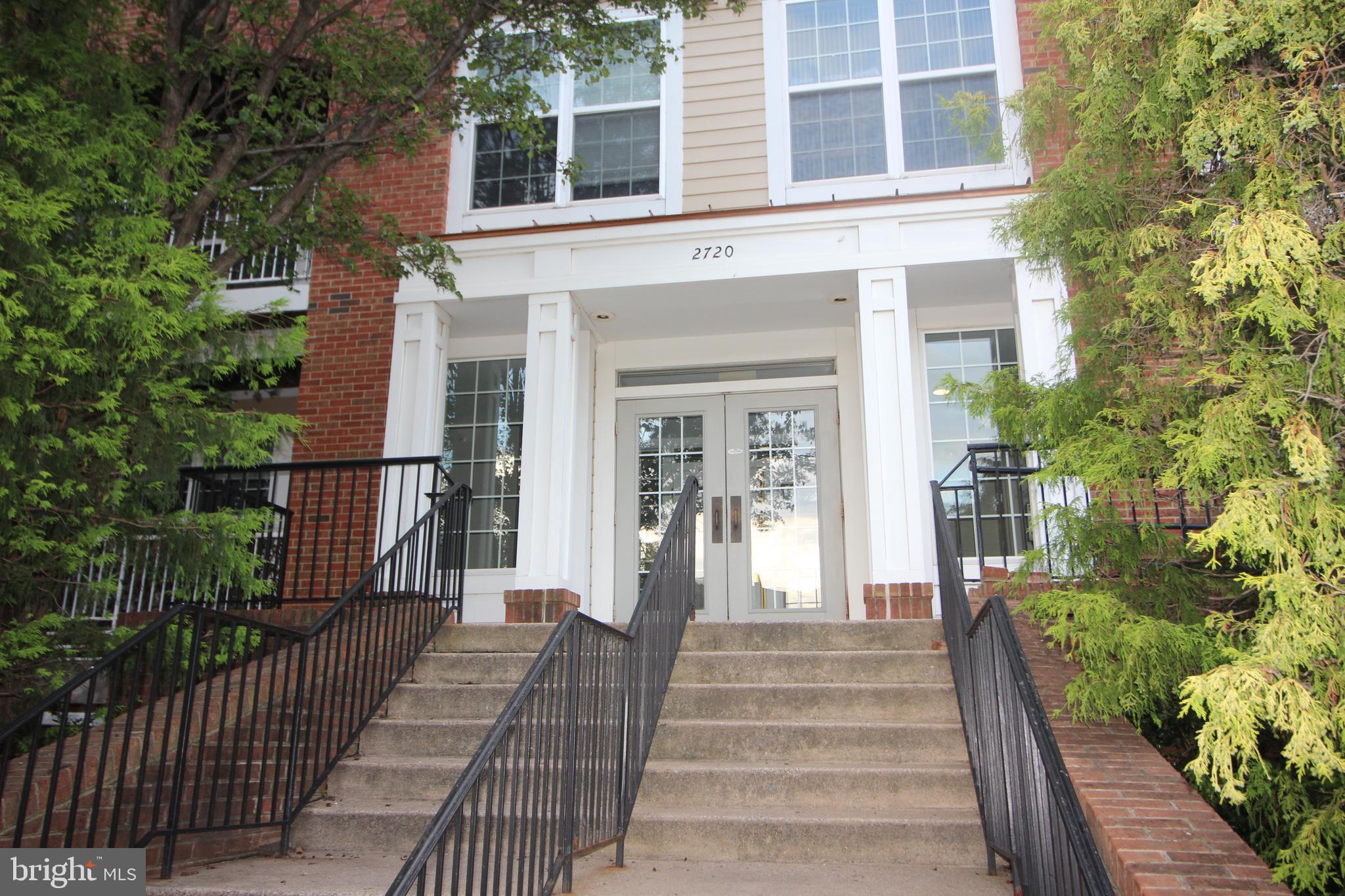 Welcome to 2720 Bellforest Ct #107 – This spacious 2-level, 2-bedroom, 2.5-bath condo combines modern style, convenience, and comfort in a secured building with elevator-access and extra storage. You'll find the 1,246 square foot condo offers well-appointed living space. The main level features an open-concept layout with hardwood floors, a cozy gas fireplace, and a dining area that is adjacent to the updated kitchen complete with granite countertops and upgraded stainless steel appliances. A large powder room, coat closet with under-stair storage, and private balcony #1 (of 2) make the space ideal for everyday living and entertaining. Upstairs, the expansive primary suite offers two closets with organizers (one of which is a large walk-in closet), a door to private balcony #2, and a luxurious en-suite bath with a large dual-sink vanity, a soaking tub, and a separate shower. The second bedroom suite includes its own full bath and generous closet space. An in-unit dedicated laundry room with full-size washer and dryer completes the upper level and offers even more storage space.
From the outdoor parking lot, you may use either the convenient ramp or steps to reach the foyer. In addition to your garage space, the condo comes with two (2) parking lot passes, sure to come in handy for a second vehicle and guests.
In the heart of Dunn Loring and across the street you'll find Dunn Loring Metro and The Shops at Avenir Place (Harris Teeter, Starbucks, many shops, services, and restaurants). The vibrant Mosaic District is less than a mile away. This home is perfectly located for commuters and lifestyle seekers alike! With quick access to major commuter routes, this is Northern Virginia living at its most convenient. This property is near Tysons Corner and Fairfax Hospital; and conveniently located between National and Dulles Airports. Fairfax County award-winning schools are nearby - Stenwood ES is just a couple of blocks away, Kilmer MS is approximately 5 minutes away, and George C. Marshall HS (featuring an IB Program) is about 15 minutes away.
The convenience of garage parking with your space near the elevator, additional assigned storage space outside of the unit, combined with great storage space within the unit – this is a home of pleasant living, a place to come home and unwind. You’re well connected here with an optional connection of Cox Cable or Verizon FiOS. A home security alarm is present and you’re welcome to have it monitored at your expense.
You’ll have access to excellent community amenities including a club house with spacious multi-use room and attached kitchen, a fitness center, shower and dressing facilities, an outdoor grilling area, and nicely landscaped common spaces. This is a pet-friendly community and the landlord will allow one dog (up to 100 lbs.) or one cat on a case-by-case basis with a pet addendum and pet deposit. They may consider special requests, also on a case-by-case basis. Please note that elevator access is within the building, not within the unit. This is a no-smoking unit. Don’t miss this beautifully maintained and move-in ready, no-smoking home in a prime location! Ashley Realty Group is proud to represent the landlord. This home is clean and move-in ready! Ask your REALTOR to show you asap - you'll be glad you did!