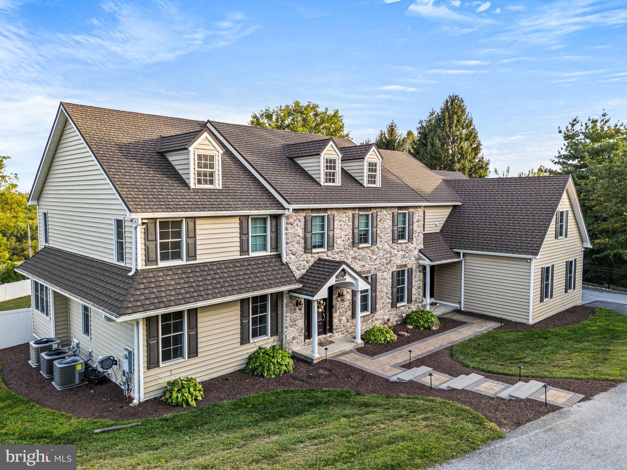 WHAT A VIEW! Welcome to this stunning and meticulously maintained 5-bedroom, 6-bathroom home just minutes from downtown West Chester. With over 6,000 sqft on the first two floors and an additional 3,000 sqft of finished walk-out basement, this residence offers unparalleled space, breathtaking views, and an ideal location.
Every detail has been thoughtfully upgraded to create a true turnkey experience. The chef’s kitchen boasts double ovens, a wine fridge, granite countertops, a spacious island with custom cabinetry, and high-end KitchenAid appliances. Custom storage solutions by Closets By Design are featured in the garage, guest room, and kitchen pantry, while the remodeled upstairs laundry room adds everyday convenience. Refined interior finishes include extended and refinished hardwood flooring, plush carpet, and Marvin windows and doors throughout.
The lower level offers more than just additional living space—it features a second kitchen, Full bathroom with Steam shower, gym, laundry, a private SwimEx indoor pool, and a state-of-the-art home theater with Dolby Atmos surround sound for the ultimate cinematic experience. Known for its advanced water current technology, the SwimEx system provides an unmatched environment for low-impact exercise, rehabilitation, and year-round fitness, right in the comfort of your own home.
Step outside to enjoy beautifully landscaped grounds with hardscaping, retaining walls, fencing, and a serene private pond. The expansive deck opens to a full outdoor kitchen equipped with a smoker, grill, stovetop, refrigerator, and ample counter space—perfect for hosting unforgettable gatherings. A hot tub with a custom concrete base and upgraded electrical adds to the backyard retreat. Additional enhancements include outdoor lighting, deck railings, tree and stump removal, and fresh paving for impressive curb appeal.
This home is equipped with modern comforts and peace-of-mind upgrades, including a back-up generator, whole-home alarm and camera systems, Wi-Fi access points with extensive networking, and multiple HVAC replacements. Efficiency is enhanced with two lifetime hot water heaters, a new well pump, and a comprehensive water treatment system.
The garage is fully outfitted with Closets By Design storage, apex flooring, and convenient storage lifts. Additional updates include roof replacement, siding, and meticulous attention to detail in every corner, from plumbing and electrical upgrades to extensive TV mounting and networking.
Please reach out for the complete list of upgrades, dates, and warranties.
This exceptional property seamlessly combines luxury, functionality, wellness, and true move-in readiness—making it a one-of-a-kind West Chester residence.