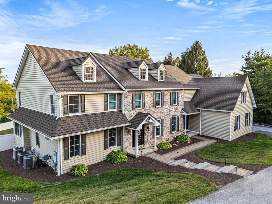 WHAT A VIEW! Welcome to this stunning and meticulously maintained 5-bedroom, 6-bathroom home just minutes from downtown West Chester. With over 6,000 sqft on the first two floors and an additional 3,000 sqft of finished walk-out basement, this residence offers unparalleled space, breathtaking views, and an ideal location.

Every detail has been thoughtfully upgraded to create a true turnkey experience. The chef’s kitchen boasts double ovens, a wine fridge, granite countertops, a spacious island with custom cabinetry, and high-end KitchenAid appliances. Custom storage solutions by Closets By Design are featured in the garage, guest room, and kitchen pantry, while the remodeled upstairs laundry room adds everyday convenience. Refined interior finishes include extended and refinished hardwood flooring, plush carpet, and Marvin windows and doors throughout.

The lower level offers more than just additional living space—it features a second kitchen, Full bathroom with Steam shower, gym, laundry, a private SwimEx indoor pool, and a state-of-the-art home theater with Dolby Atmos surround sound for the ultimate cinematic experience. Known for its advanced water current technology, the SwimEx system provides an unmatched environment for low-impact exercise, rehabilitation, and year-round fitness, right in the comfort of your own home.

Step outside to enjoy beautifully landscaped grounds with hardscaping, retaining walls, fencing, and a serene private pond. The expansive deck opens to a full outdoor kitchen equipped with a smoker, grill, stovetop, refrigerator, and ample counter space—perfect for hosting unforgettable gatherings. A hot tub with a custom concrete base and upgraded electrical adds to the backyard retreat. Additional enhancements include outdoor lighting, deck railings, tree and stump removal, and fresh paving for impressive curb appeal.

This home is equipped with modern comforts and peace-of-mind upgrades, including a back-up generator, whole-home alarm and camera systems, Wi-Fi access points with extensive networking, and multiple HVAC replacements. Efficiency is enhanced with two lifetime hot water heaters, a new well pump, and a comprehensive water treatment system.

The garage is fully outfitted with Closets By Design storage, apex flooring, and convenient storage lifts. Additional updates include roof replacement, siding, and meticulous attention to detail in every corner, from plumbing and electrical upgrades to extensive TV mounting and networking.

Please reach out for the complete list of upgrades, dates, and warranties.

This exceptional property seamlessly combines luxury, functionality, wellness, and true move-in readiness—making it a one-of-a-kind West Chester residence.