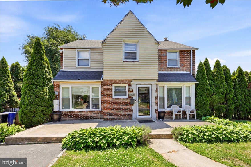 Welcome to this beautifully updated 4-bedroom, 2 full and 2 half bath Woodmere Colonial, offering exceptional space, versatility, and a distinctly modern feel throughout. From the moment you arrive, the home’s classic curb appeal sets the stage for what’s inside.

Step into the inviting foyer, where you’re greeted by a bright, open layout accented by neutral tones, updated flooring, and abundant natural light, creating a clean, contemporary aesthetic across the main living spaces. The spacious living and dining rooms flow seamlessly, making everyday living and entertaining effortless.

The renovated kitchen is a standout feature, showcasing crisp white cabinetry, quartz countertops, stainless steel appliances, and stylish tilework, perfectly blending modern design with functionality. Just off the kitchen, enjoy a sun-filled enclosed porch ideal for three-season entertaining or relaxing.

The first floor also includes a tucked-away powder room and a flexible den/office space that can easily serve as a 5th (guest) bedroom or playroom.

Downstairs, the fully finished basement offers a high-end feel with plush carpeting, recessed lighting, and a built-in projector, creating the perfect media or recreation space. Additional areas include a storage room, utility space with washer and dryer, and a convenient updated powder room.

Upstairs, the generously sized primary suite features a modern full bath and ample closet space. Three additional bedrooms and a bright, updated hall bathroom complete the second level.

Additional upgrades include gas heat, central air, vinyl windows, and updated electrical, plumbing, and fixtures.

Outside, the fully fenced backyard offers privacy with mature arborvitae, along with multiple outdoor living spaces including a front porch and rear patio. A private driveway accommodates up to four cars, plus ample street parking. A 240V/ 50-amp electrical outlet was installed to conveniently charge electric vehicles (EV) or even a RV.

Ideally located within walking distance to Brookline and Oakmont shops and dining, and just minutes from Ardmore, public transit, parks, and top-rated schools. Situated in the highly sought-after Chestnutwold Elementary catchment, this home delivers a rare combination of modern style, functional layout, and prime Havertown location.
