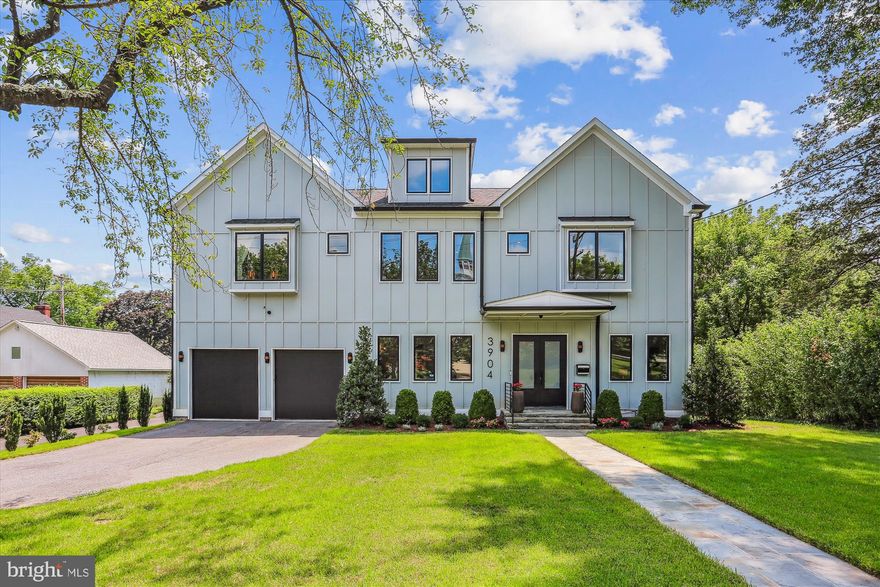 NEW PRICE! When artistic vision and masterful craftsmanship meet in a prime Chevy Chase View location, the result is extraordinary. Welcome to 3904 Dresden Street, a breathtaking 7,500 square foot residence reimagined through a 2020 whole-house renovation, offering unparalleled luxury across four meticulously finished levels.

From wide-plank hardwood floors and curated designer lighting to Andersen windows and bespoke tilework, every element speaks to exceptional quality. Expansive front-to-back sightlines enhance the seamless indoor/outdoor connection, while the floorplan-with 6 bedrooms, 5 full and 2 half baths-was designed with both elegant entertaining and comfortable daily living in mind.

The heart of the home is the chef’s kitchen, featuring a striking waterfall quartz island, Thermador 48” range, two dishwashers, and a walk-in pantry. Adjacent is a custom mudroom with a second refrigerator and additional storage. The kitchen opens to a screened-in porch with fireplace and a sun-filled family room with floor-to-ceiling built-ins and a fireplace with dramatic basketweave tile surround. Step outside to a flagstone patio and a flat, private backyard, beautifully bordered by mature trees for natural privacy.
A main-level suite with ensuite bath and walk-in closet offers an ideal retreat for multigenerational living, guests, or a luxe home office. A chic powder room and elegant living and dining spaces and a butler’s pantry with a 3rd dishwasher and beverage fridge complete the main level.

Upstairs, the primary suite is a true sanctuary-featuring a generous bedroom with adjoining sitting room and private balcony, two custom walk-in closets, and a spa-inspired bath with a jacuzzi hydrotherapy tub, steam shower, and dual vanities. Three additional bedrooms include custom features like built-in window seats, ensuite and jack-and-jill baths, and a stunning second-level family lounge. The laundry room is thoughtfully designed with two washers, two dryers, and a built-in drying rack.

The third floor is full of possibilities-featuring a large bedroom, full bath, and flex space ideal for a second office, playroom, or creative studio.

On the lower level, enjoy a fully-outfitted media room with projection screen, a recreation and billiards area, and a professional-grade fitness room-all with walk-out access to the backyard.

Behind the scenes, no detail has been overlooked: spray foam insulation, rock wool soundproofing, tankless hot water, and dual HVAC systems with humidifiers ensure maximum comfort and efficiency.
Situated on a level 19,000+ square foot lot, this home delivers rare privacy and convenience. Just minutes from top schools, Rock Creek Park trails, Antique Row, Kensington’s farmers market, and the growing local dining scene-3904 Dresden is a one-of-a-kind home for those who expect nothing less.