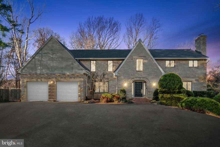 Rare opportunity to own a spacious, contemporary gem in an unbeatable location.    Nearly 7,000 square feet of thoughtfully designed living space on over an acre of serene, wooded privacy. This home has been lovingly and responsibly maintained with a significant number of recent updates to include a brand-new roof and a stunning new deck that spans the entire back of the house. The grand two-story foyer with dual staircases makes a stunning first impression. Gleaming wood floors extend across the main level, upper hallway, and into the primary bedroom. The family room is a showstopper!  It features a charming stone fireplace, a built-in bar and sky-high ceilings.  It is overlooked by a catwalk that connects the upper-level bedrooms on either side of the home. The owners suite is a true retreat, boasting a spacious and bright ensuite bath with a jacuzzi tub, shower, and large skylight for a spa-like experience. New carpeting in the additional bedrooms ensures comfort for family and guests alike. The main-level bedroom and full bath provide convenience and accessibility for guests or multi-generational living. The fully finished walk-out lower level features an enormous recreation room, additional bedroom, full bath, and oversized storage area with built-in shelving and a wet bar—perfect for entertaining or everyday use.  Situated in highly coveted Potomac, MD, you are moments away from major routes like I-270 and Route 495, Potomac Village, Cabin John Center, Strathmore Hall, Pike and Rose, and the evolving Rockville Pike corridor. With easy access to bustling Bethesda and downtown Washington, DC, you are perfectly positioned for convenient commuting.