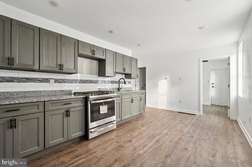 This 2 bedroom apartment can be used as a one bedroom with a den or a modest 2 bedroom apartment. This property also includes the basement space that will be great for storage and has laundry tucked away. Everything in this property is updated with modern cabinetry, granite countertops, central air, stainless appliances, ceramic tiled bathroom, a back yard space. Don't miss your opportunity! You can walk to center city to get there by train in 5 minutes. Great location and very walkable. 1-2 Occupants Only are allowed.