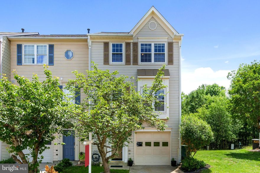 Welcome to 11279 Kessler Place—a charming and well-maintained 3-bedroom, 2.5-bath end-unit townhouse offering comfort, convenience, and plenty of space both inside and out. Nestled quietly in the back of the community with peaceful water views, this home is just steps from the dog park and minutes to everything you need.
Step inside to find laminate floors on the main level, a bright and open layout, and a kitchen that flows easily into the dining area and family room—ideal for everyday living and entertaining. The upper level features a spacious primary suite with en-suite bath, plus two additional bedrooms and a full hall bathroom.

Downstairs, the full walk-out basement offers fantastic flexibility. Cozy up by the fireplace or use the space as a den, home office, playroom, or all-purpose room—whatever fits your lifestyle.

Outdoor living is a dream here with a two-story deck and lower patio overlooking the water. The upper deck features a canopy, providing shade and comfort for sunny afternoons.

Enjoy recent updates that offer peace of mind, including a new fence (2024), new HVAC system (2023), and a roof replaced in 2015. The home also includes a one-car garage and a private backyard.

Located just minutes from schools, the library, shopping, restaurants, and major commuter routes, this home combines everyday convenience with a peaceful, tucked-away feel.

Whether you're working from home, entertaining friends, or enjoying quiet evenings on the deck, 11279 Kessler Pl is the perfect place to call home.