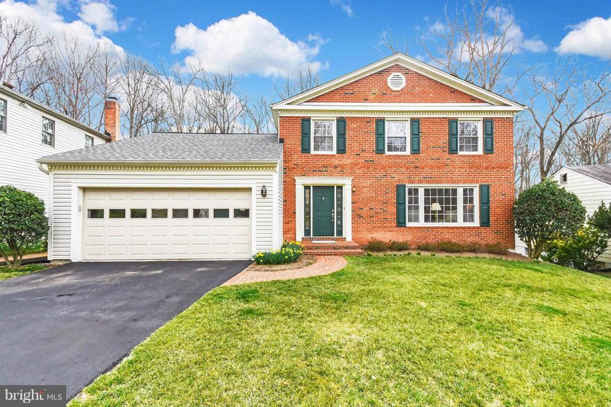 Over 2500 Sq. ft of living space on 3 levels.HW floors throughout the main level, formal LR & DR, FR w/ a fireplace,& sliding doors to the custom deck w/ lighting.Open kitchen with quartz counters & separate eating area. 4 nice sized BRs on the upper level with new carpet and upgraded baths. LL w/ huge rec room, laundry, extra storage,a sliding door to a stone patio overlooking a landscaped yard.