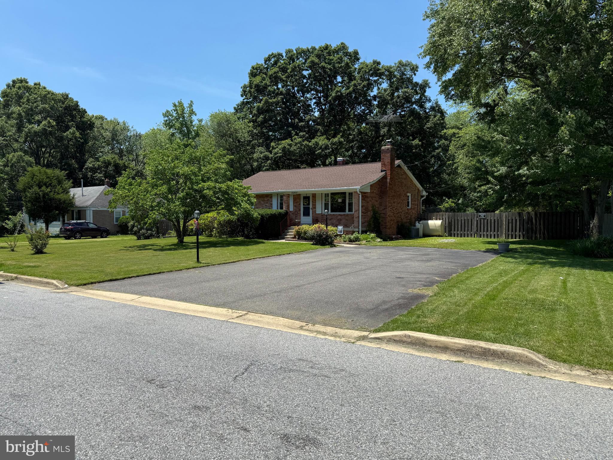 Great starter home. This house is all brick, covered front porch, hardwood flooring, ceramic flooring, full hall bath with tub/shower combination. Primary with half bath, wood trim throughout the home. Formal dining room, living room, basement with laundry room, nice family room with fireplace, full bath and bedroom. Walk-up stairs to beautiful back yard with patio, deck, fully fenced in rear yard and shed. Double wide asphalt driveway, newer roof. Your buyers will fall in love this home as soon as they see the private back yard. More photos to come.