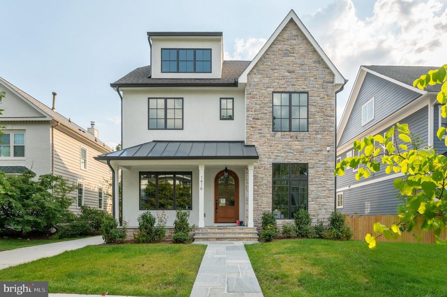 New construction by CR Custom Homes in the heart of Lyon Village, just two blocks from Clarendon Metro, shopping, parks, and dining. This thoughtfully designed 4-level home with detached two-level garage offers over 5,500 square feet of finished living space with 7 bedrooms and 7.5 baths on a 0.15 acre lot, ideal for those seeking both luxury and functionality in one of Arlington’s most sought-after neighborhoods.

The welcoming flagstone front porch opens to a sophisticated and intentionally designed interior including designer light fixtures, upgraded trim and white oak engineered hardwood floors, solid wood interior doors, and elegant fixtures and finish work throughout. The main level features 10-foot ceilings and includes a formal dining room with herringbone floor detail, a flex room that can serve as a home office or guest bedroom with an en-suite full bath, a powder room with custom stone sink, and a large family room with fireplace. The adjoining gourmet kitchen is outfitted with custom frameless cabinetry, quartz countertops and backsplash, and Wolf, Cove, and Sub-Zero appliances, a custom exhaust hood, a walk-in pantry, and a well-appointed butler’s pantry. The mudroom offers practical storage with built-in cubbies and benches, and the screened-in porch and stone patio off the family room are ideal for indoor-outdoor flow.

Upstairs, the second floor features nine-foot ceilings and includes a spacious primary suite with dual walk-in closets and a luxurious bathroom with a double vanity, soaking tub, and oversized shower. Three additional secondary bedrooms each offer en-suite bathrooms and ample closets. A laundry room with custom cabinetry and a sink completes the upper level.

The top loft level includes a bright bonus room, bedroom, full bath, and extra closet space. The finished lower level offers another bedroom and full bath, an exercise room, a large rec room with a wet bar and seating area, plus additional storage. Spacious closets on each level could accommodate a future elevator installation. 

The home also includes a detached two-story one-car garage with a Clopay door, featuring automatic opener with battery backup and camera, and a second floor ready to be customized with potential for an upper-level finished studio/flex space and full bath, ideal for guests, work-from-home setups, or a creative space (customization not included in sales price).

A solid wood front door, designer exterior lighting and landscaping add curb appeal, while the stone and stucco exterior, architectural shingles, oversized 6-inch gutters, and an advanced drainage system with sump pump and battery backup ensure lasting performance.

Energy-efficient features include two multi-zone Carrier HVAC systems with Honeywell electronic dampers and programmable EcoBee thermostats, a high-efficiency hot water heater, R-19 wall insulation with spray foam in rim joists and R-49 blown-in attic insulation, Pella bronze-finished casement and fixed windows, and a Typar weather protection system. Inside, you’ll find CAT6 wiring throughout, LED recessed lighting, a 400-amp underground electrical service with dual panels, serving a full designer lighting package. 

Designed for modern living in one of Arlington’s most vibrant neighborhoods, this home offers space, style, and location in equal measure!