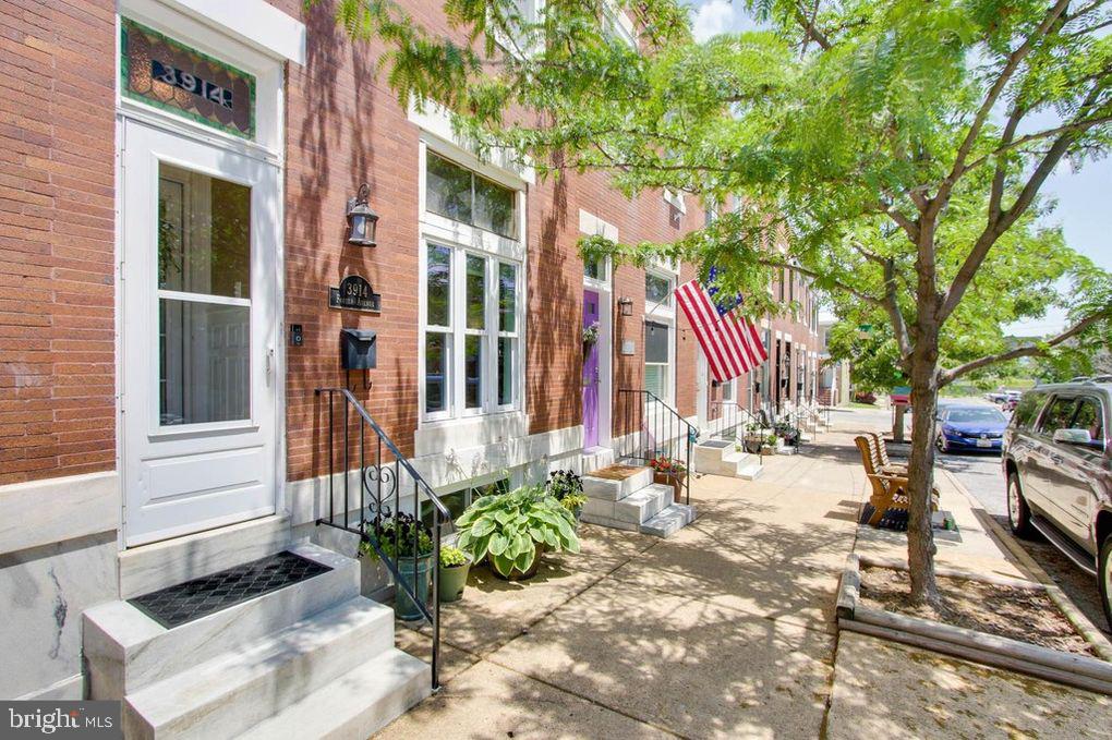 AVAILABLE IMMEDIATELY! OPEN HOUSE TUESDAY, APRIL 4TH 5:30 - 7:30 PM! Beautifully updated, spacious home with 1-car detached garage, outdoor entertaining space and private lower level with separate entrance. Marble steps, stained glass transom and foyer provide classic Baltimore charm and open to bright, extra wide living room with crown molding, exposed brick and large windows. Gourmet kitchen with granite counter-tops, plentiful cabinet space, stainless steel appliances and large pantry. Upper level features luxurious master suite with attached spa bath with double vanity and walk in closet. Additional bed and full, updated bath on bedroom level with access to partially covered maintenance free deck! Full, fully finished basement with separate entrance features a full bath and open living area or third bedroom, which could be a great separate rental if desired. Secure garage parking and storage galore! Skylights and beautiful details throughout! Minutes to the Canton Waterfront Promenade, Fells Point, The Inner Harbor, Johns Hopkins Medicine, Downtown, I-95, I-895, Fells Point Harbor East, & Historic Patterson Park. PETS CASE BY CASE. NO SMOKING. All applicants will have to complete an application and background check.