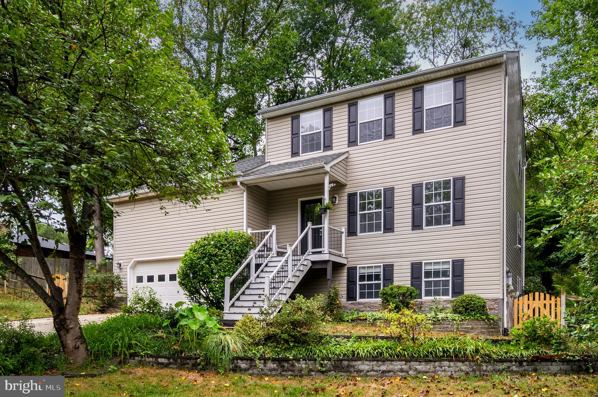 Welcome to your dream home nestled in a serene park-like setting! This stunning Colonial house offers a perfect blend of modern upgrades and classic charm, making it an ideal retreat for families or anyone seeking a peaceful yet conveniently located haven.
The beautifully updated home boasts fresh new paint and flooring throughout. The spacious main level includes a living room, dining room, family room, and half bath. The heart of the home features a brand new kitchen, equipped with state-of-the-art appliances, sleek countertops, and abundant cabinetry. Cooking and entertaining have never been easier or more enjoyable! The composite deck is just steps away and the perfect spot to grill.
The upper level encompasses a primary suite with vaulted ceiling and attached bath. There are two guest bedrooms and a hall bath, providing ample space for family and guests.
The lower level is a hidden gem, boasting a comfortable 4th bedroom and a full 3rd bath, perfect for an in-law or au pair suite. This private space offers flexibility and convenience for multigenerational living or guests. In addition there is a room that could be a game room or home theater.
Set on a generous .86-acre lot, this property is a nature lover's paradise! Enjoy your own orchard with fruit trees, including pear and plum, as well as a bounty of blackberries, blueberries, and raspberries. The lush landscape invites outdoor gatherings, playtime, or simply moments of tranquility.
A standout feature is the expansive 50-foot carport, ideal for storing your boat or RV. Enjoy the freedom to explore the great outdoors without worrying about where to park your toys!
Located in the highly desirable water privileged community of Bon Haven. The voluntary community association members have access to a pier, slips, and a boat ramp, making waterfront activities easily accessible. Imagine spending weekends on the water, fishing, or simply soaking in the sun! Currently, boat slips are available starting at just $300 per year.
Despite its secluded feel, this home is perfectly positioned for an easy commute to Washington D.C., Ft. Meade, Baltimore, or the Naval Academy. Enjoy the tranquility of suburban living with all the conveniences of city life just minutes away!