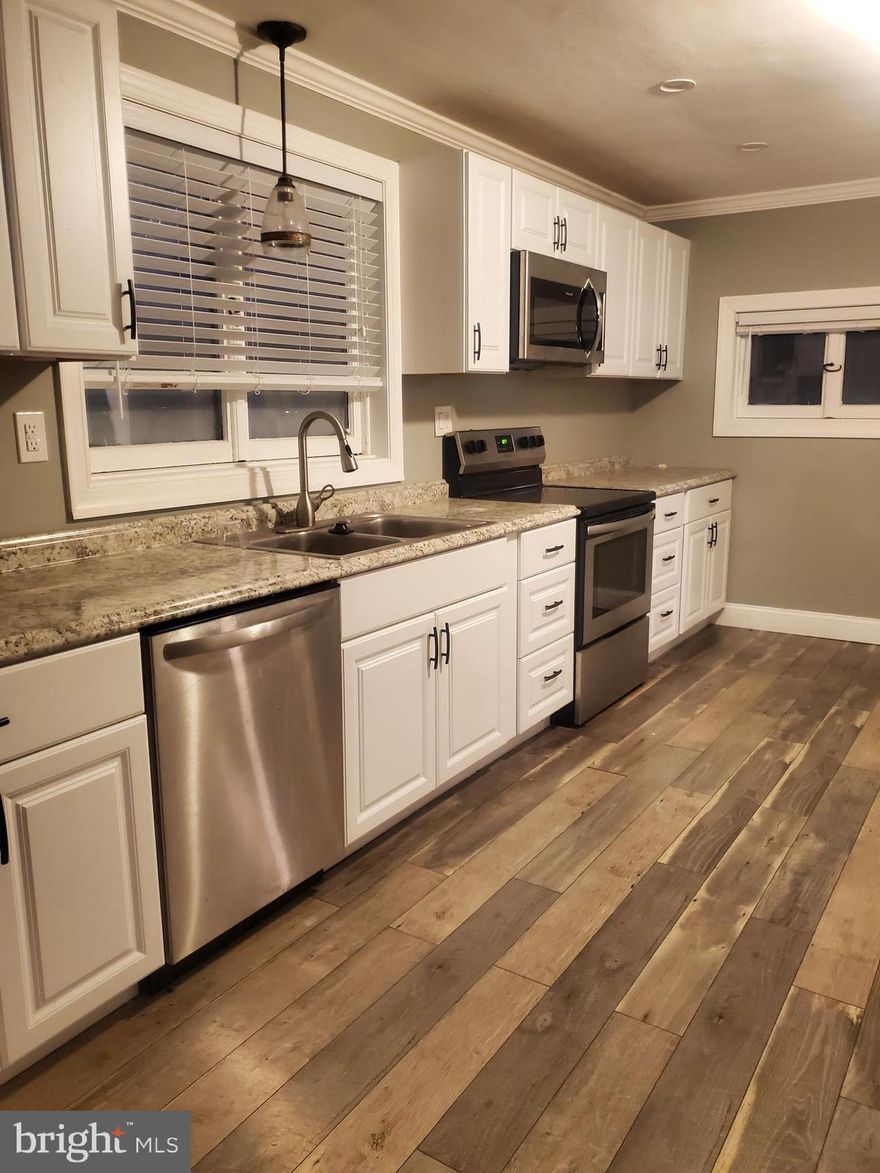 Your new rental awaits! This spacious 4-bedroom, 2-bathroom home, nestled in a desirable community, is ready for you. Partially renovated, it offers a mix of modern comfort and potential personalization. Enjoy ample parking and the welcoming atmosphere of a great neighborhood. Contact me to secure this fantastic rental opportunity.