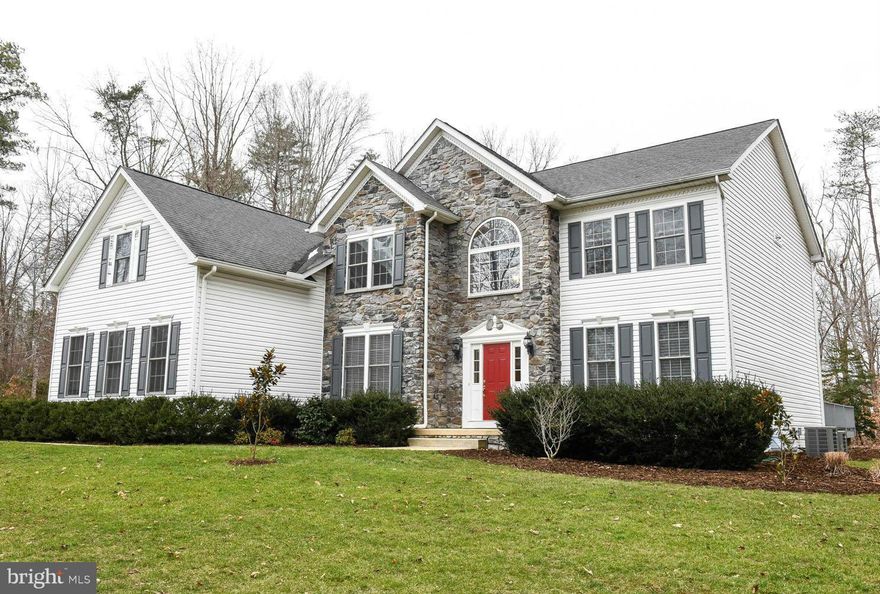 Lovely Oxford model with open floor plan and dual staircases. Private 2 acre lot, backs to trees in desirable Forrest Farm. Gourmet kitchen with island, DBL oven and granite countertops, adjacent large family room and sunroom with lots of windows for natural light. Beautifully finished basement with large rec. room, separate theater room, gym and large storage areas.