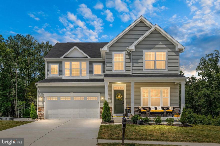 IN LAW SUITE! 5300 SQ FT! POOL COMMUNITY! Presenting a spectacular new construction home (2 years young) situated in the desirable Lee's Parke community. This barely-occupied residence showcases model home quality. The expansive "Seneca" model offers six bedrooms, 4.5 bathrooms, and 5,369 square feet of luxurious living space. Skip the new build wait! The property boasts a gorgeous setting on 19,571 square feet of land, overlooking a serene wooded area. The home features a gourmet chef's kitchen with a large center island, Quartz countertops, a breakfast area, a sizable island with bar seating, and quality Stainless-Steel Appliances. The kitchen seamlessly connects to the spacious family room, complete with a gas fireplace. Nine-foot ceilings throughout the main level and oversized windows create a bright and airy ambiance. The owner's suite includes two walk-in closets, a luxurious bathroom with double vanities, a separate shower, and a soaking tub. The home has been upgraded with Luxury Vinyl Plank Flooring throughout the main level. The finished lower level provides a full one bedroom apartment an additional bedroom, full bathroom and an amazing kitchen. An additional storage room could be finished or used as a generous storage area. Enjoy the amazing deck and well-sized backyard that backs onto a wooded area, ensuring excellent privacy. Ideal for large family gatherings and entertaining. The property includes a two-car attached garage with an automatic opener. The community offers excellent amenities, including a clubhouse with a fitness center, a community pool, walking paths, tennis courts, and a playground. Conveniently located near I-95 to HOV toll lanes, providing quick access to Quantico, Fort Belvoir, the Pentagon, and DC. Enjoy numerous shopping, entertainment, and grocery options within minutes. The Spotsylvania VRE station is just 15 minutes east, and Downtown Fredericksburg is 20 minutes northeast.