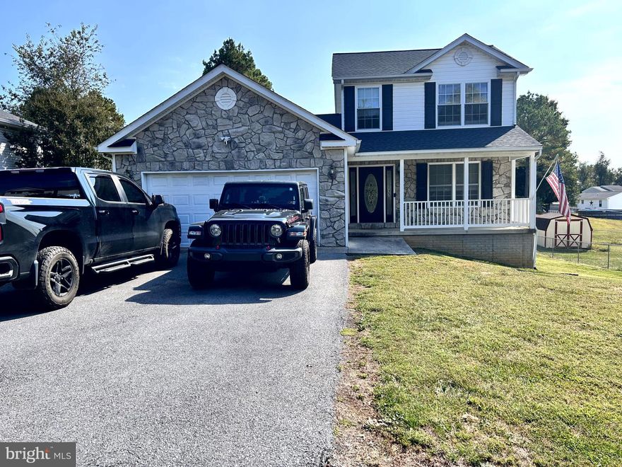 Nestled in the established community of Opequon Meadows, this inviting colonial home blends everyday comfort with thoughtful details.  New roof (2024), HVAC system (2017/2018).  With 3 bedrooms and 2 baths, it’s designed to fit your lifestyle while leaving room to grow.  The main level welcomes you with a spacious living room that flows into the open kitchen and dining area, creating a perfect space for gathering. The kitchen features newer stainless steel appliances, plenty of cabinetry, and a pantry to keep everything organized. The dining area easily accommodates a full table, making it ideal for hosting family dinners or casual get-togethers. A convenient laundry closet is also located on this level.  Upstairs, two light-filled bedrooms offer cozy retreats, along with a full bath. The lower level provides a full unfinished basement—complete with rough-ins for another bathroom and walk-out access to the backyard—offering endless potential for future living space or recreation. With a sump pump and battery backup already in place, you’ll have added peace of mind.  The oversized garage not only protects your vehicles but also includes overhead storage racks for all your extras. Step outside to a beautifully maintained yard with a deck and storage shed, creating a great setting for barbecues, gardening, or simply enjoying the outdoors.   To top it off, the location couldn’t be more convenient—just minutes from major highways, local schools, shopping, and the MARC train, making daily commutes and weekend outings a breeze.  Priced to sell, so schedule your private tour today.