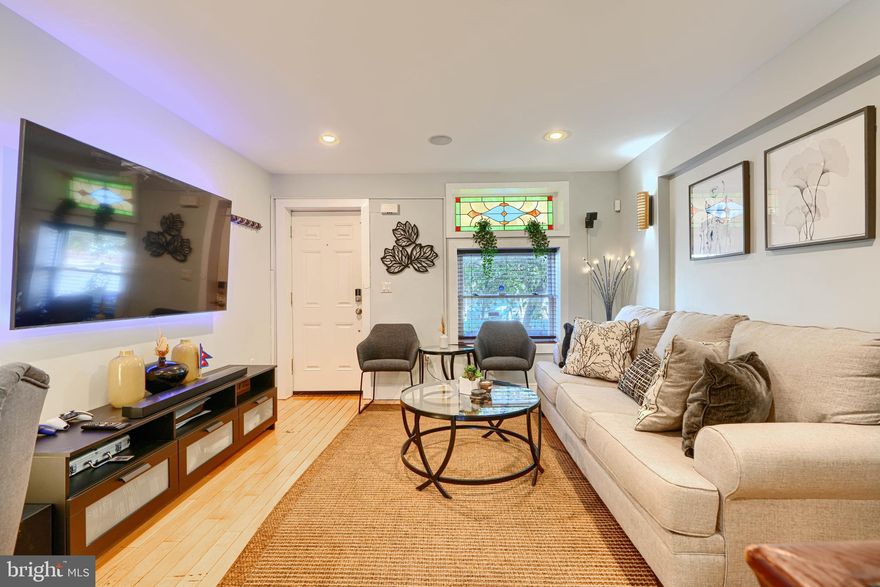 Two owner suites. Wet bar. Floating staircase. Whole-house surround sound. 1717 Gough Street is not your average Fells Point rowhome — it is a lifestyle upgrade at an unbeatable price. Priced at $389,900, this is your opportunity to own one of Upper Fells Point's most thoughtfully upgraded homes before someone else does. This stunning 4-bedroom, 3.5-bath brick rowhome spans three finished levels and blends historic charm with high-end modern finishes throughout. The main level welcomes you with gleaming hardwood floors, recessed lighting, and an open floor plan perfect for entertaining. The chef's kitchen impresses with granite countertops, stainless steel appliances, ample cabinetry, and a breakfast bar. Two owner's suites each feature their own private en-suite baths on the 2nd and 3rd floors — ideal for multi-generational living, house hacking, or maximizing rental income. The entertainment nook with wet bar and wine fridge is a showstopper. The custom floating staircase and accent lighting nooks showcase the craftsmanship found in every corner of this home. Step outside to a private fenced patio ideal for outdoor dining and entertaining. Walk to Patterson Park, Fells Point waterfront, local shops and restaurants, with easy access to Johns Hopkins, I-95, and downtown Baltimore. Seller is motivated — bring your best offer. This will not last at $389,900.