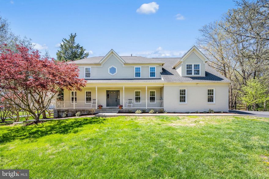 JUST LISTED! OPEN HOUSES SAT 4/11 AND SUN 4/12, 1-3PM! Welcome to 20116 Sweet Meadow Lane, a spectacular property with over 4,500 square feet of living space and set on approximately 1.3 acres in the Laytonsville Knolls community and with no HOA. This 5-bedroom, 4.5-bath home combines generous interior space with expansive outdoor areas, and includes a walk out lower level with in-law suite and potential 6th bedroom! Upon arrival you'll be greeted by a charming front porch, and once inside a soaring 20-foot-high ceiling in the foyer is the ideal entrance to this sensational home. The main level features a formal dining room, a stone-surround wood-burning fireplace, and recessed lighting was recently added in the formal living room and the adjacent family room and kitchen area. The open kitchen offers a spacious island, beautiful quartz counters, stainless steel appliances, a double wall oven, impressive cabinet and pantry space, an eat-in breakfast area, and direct access to a huge deck overlooking the expansive fenced-in rear yard. The main level laundry room is separated from the kitchen area by a soft-close pocket door and down the hall from the main level bedroom/office which includes a built-in murphy bed, and an adjacent full bathroom, providing flexible living options. The attached two-car garage connects conveniently to the main level. The upper level includes an immaculate primary suite with a large walk-in closet, private vanity and dressing area, gorgeous en-suite bathroom with dual sinks, a walk-in shower, and a deep soaking tub. There are three additional spacious bedrooms with large closets including a walk-in closet, and a shared hall bathroom with skylight and frameless glass shower door. The walkout lower level functions as an awesome rec room with direct access to the rear patio and yard, or the ideal in-law or au pair suite, as it includes an updated second kitchen, separate washer and dryer, full bathroom, large private bedroom, and the walkway connects directly to the extended driveway with no stairs to climb. The rear yard is fully fenced, with endless possibilities for gardening, play areas, or maybe even a pool! Nearby amenities include Blue Mash Golf Course, Lone Oak Farm Brewing Company, Sandy Spring Adventure Park, and other local services and recreation options. This property offers a substantial home with versatile living spaces in a convenient setting with access to the wonderful community features of the town of Olney and also the City of Gaithersburg. What an amazing place to call home!