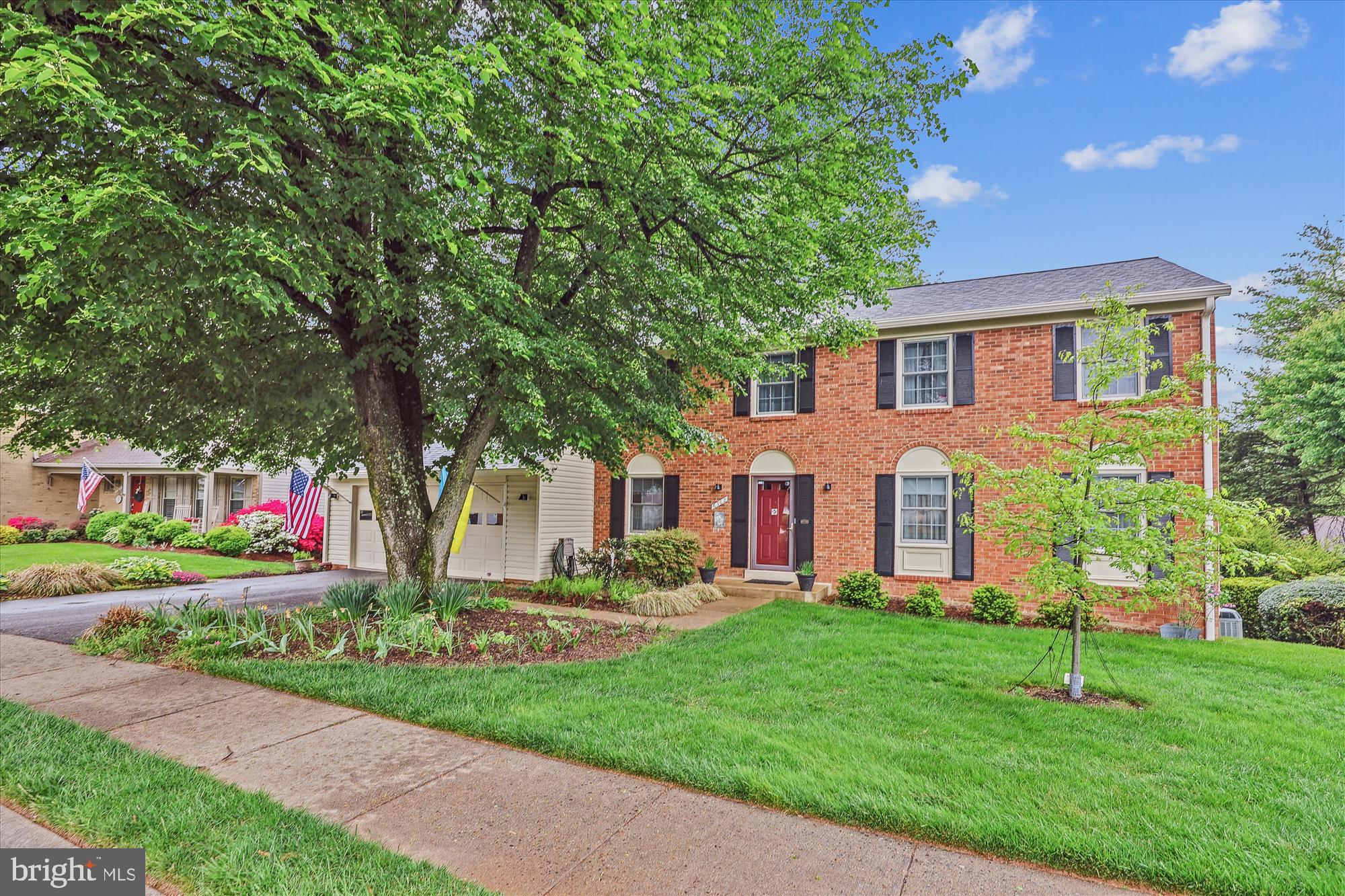 Welcome to 6302 Windward Drive, nestled on a quiet street in Burke Centre. This brick-front Cumberland model colonial by Southern Engineering Corporation Builders offers 3,162 square feet of living space across three finished levels, featuring 4 bedrooms, 2 full bathrooms, and a powder room.
The private .22-acre lot offers a meticulously landscaped backyard bordered by mature trees, numerous flowering varieties, and garden beds, plus a walk-down deck, screened porch, and paver patio — ideal for relaxing and entertaining.
Too many upgrades to list including: NEW ROOF in 2025 (Owens Corning FLEX roof with SureVent ridge cap), NEW GUTTERS & DOWNSPOUTS in 2025 (6-inch K-style with Leaf X gutter guards), NEW OIL FURNACE in 2021 (high efficiency with air filter system), DOUBLE-PANE WINDOWS, 20KW WHOLE HOUSE GENERATOR, ELECTRIC PANEL UPGRADED 200 AMP/LARGER PANELS, NEST FIRE/SMOKE/CO SYSTEM, SECURITY CAMERAS FRONT AND BACK, NEST CONTROLLED HVAC, ATTIC SEALED AND INSULATED, CLIMATE CONTROLLED GARAGE WITH EPOXY FLOOR AND LIFTMASTER OPENER FOR DELIVERIES, LOWER LEVEL ROUGH-IN PLUMBING FOR ADDITIONAL BATHROOM, SCREENED IN PORCH AND DECK ADDED, HARDWOOD FLOORS, RECESSED LIGHTING, KITCHEN AND BATHROOM UPDATES, and more!
The kitchen was completely remodeled in 2006 with a new floor added in 2022. It boasts a center island with a breakfast bar, an induction range, new refrigerator (2023), stainless steel appliances, upgraded countertops, tons of storage space, a pot-filler, tile backsplash, and a breakfast area with table space. The kitchen opens to the family room featuring a propane insert fireplace and access to the screened porch and deck.
Formal living and dining rooms, a powder room, a laundry/mudroom, and access to the attached garage complete the main level.
Upstairs, you’ll find four spacious bedrooms and two full bathrooms. The owner’s suite includes an en-suite with a modern vanity and stylish finishes. The hall bathroom was remodeled in 2024 to include heated floors and ADA compliant grab bars.
The walk-out lower level offers a large rec room with flexible space — perfect for a lounge, playroom, gym, or guest room. In addition, you will find a workshop and abundant storage space.
Prime location convenient to shopping, dining, entertainment, major commuter routes. Enjoy an abundance of neighborhood amenities, including numerous local parks, tennis and pickleball courts, jogging trails, playgrounds, clubhouses, and available membership for five outdoor pools. Minutes to South Run sports and recreation center.
Don’t miss the opportunity to own in this sought-after location!