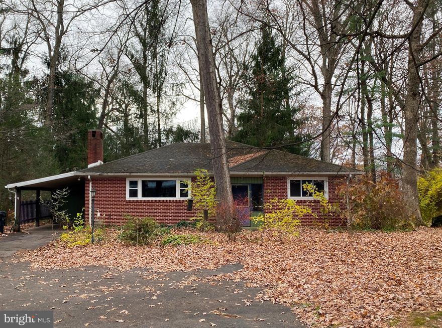 Well built, all brick ranch on a private wooded lot in the Borough of State College. With your personal touches, this Borough home can be glorious again. Large rooms with an open floor plan are very inviting. The spacious living room includes a brick fireplace and great natural light. The kitchen includes a breakfast bar and first floor laundry area. There is also a huge den or second living room just off of the entry way. The main bedroom includes a full bath with a shower and there are 2 other spacious bedrooms that share a bathroom and closet. The partial basement and crawl space is accessed from the enclosed porch. The owner has replaced some windows and the furnace is 10 years old. There is a radon mitigation system in place. Bring your ideas and take a look at this charming brick home, you will be glad you did.