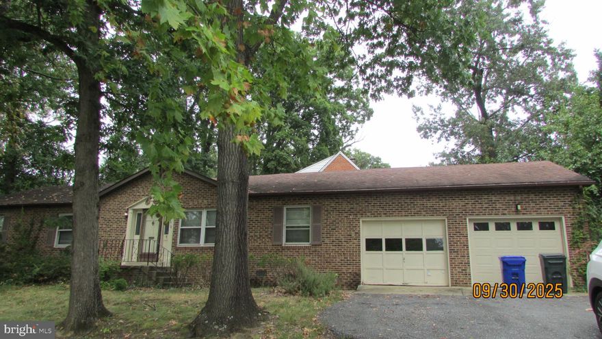 Location, Location, Location.  This home is close to UMD.   ALL ON ONE LEVEL-NO STEPS ALL BRICK 5 Bedrooms 2 Full Baths Rambler and a 2 Car Attached Garage!  Plus a 3 season Porch w/glass & AC Unit.  Floor to ceiling brick fireplace. Convenient to Restaurants, Whole Foods, Bars, Trader Joes.  Trail next door.