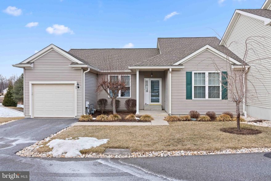 Enjoy maintenance free living with a lifestyle in the sought-after 55+ community Fox Hill Farms! This charming home maximizes one floor living with an open-concept floor plan, perfect for effortless living and entertaining. The formal dining area flows seamlessly into a cozy living room with a gas fireplace and abundant natural light, while the eat-in kitchen boasts ample storage and counter space for your day to day routine. Step into the screened-in porch and enjoy serene, private views of the community pond. The primary suite offers a walk-in closet and an en-suite bath, while a guest bedroom, full hall bath, and convenient laundry complete the main level. Downstairs, an expansive walk-out basement provides ample living space with another gas fireplace,  and extra storage. Enjoy an amenity-rich lifestyle with walking trails, indoor and outdoor pools, and a vibrant community with plenty of activities! Conveniently located near shopping, dining, and major routes including 322, 95, 202, and 1. Don't miss this opportunity to embrace low-maintenance living in a fantastic location!