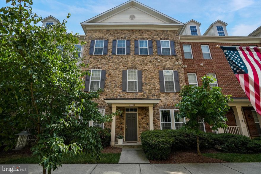 This beautiful 3-level stone-front home offers 3 bedrooms, 2 full baths, and 2 additional bonus rooms, perfect for use as offices or extra living space. The main level features hardwood floors throughout the living and dining rooms, a fireplace, and plenty of natural light. The kitchen includes cherry cabinets, granite countertops, stainless steel appliances, and tiled flooring. A separate laundry room, powder room, and easy access to the garage with overhead storage are also on the main level. Upstairs, the primary suite includes a sitting area, walk-in closet, and an en-suite bathroom with double sinks, a soaking tub, separate shower, and water closet. The first bonus room/office is located just outside the primary suite. The top level features two large bedrooms with walk-in closets, another full bathroom, and the second office. Located in the desirable Stone Ridge community, you'll have access to a beautifully renovated clubhouse, fitness center, three pools, tennis and basketball courts, and more. Close to shopping, dining, wineries, and major commuter routes. This home combines space, convenience, and amenities for comfortable living. The HOA/Condo fee also includes the home’s exterior maintenance. OPEN HOUSE Sunday 9/22 from 2 - 4pm!