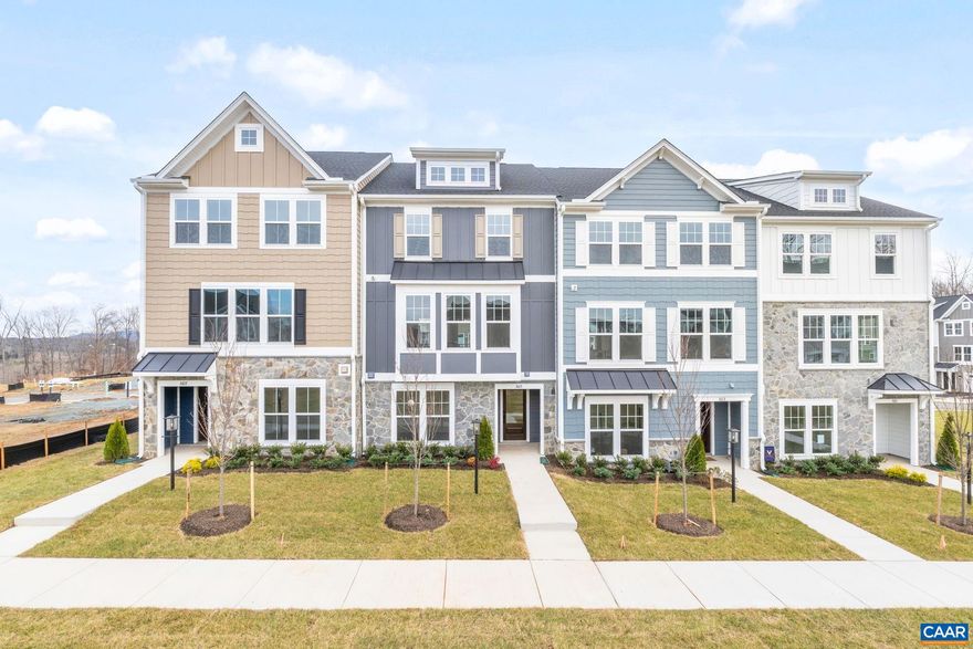 Just completed - actual photos! Introducing the Holly II, a three-story townhome coming to the newest phase of Belvedere. This layout offers flexibility and space, starting with a first-floor bedroom and full bath that could work well as a guest room, home office, or extra hangout area. The main level includes a roomy kitchen with a walk-in pantry, open dining space, and a bright family room, along with a convenient half bath. Upstairs, you?ll find the primary suite with its own private bath, two additional bedrooms, a shared hall bath, and laundry nearby for easy access. Features like oak stairs with open railings and gas appliances add a clean, finished feel. A two-car garage sits at the back of the home, providing both parking and additional storage.  Belvedere offers an array of amenities, including access to parks, close proximity to the Rivanna trailhead, the nearby SOCA Fieldhouse, a dedicated dog park for pet owners, and enchanting playground areas.,Granite Counter,Maple Cabinets,Painted Cabinets,White Cabinets,Wood Cabinets