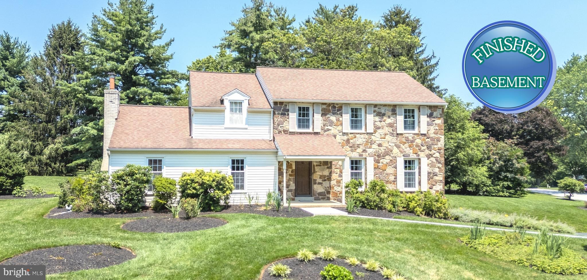 Your dream home in the Great Valley School District awaits! Tucked away on a premier corner cul-de-sac lot in the sought-after Brooklands neighborhood, 13 Anthony Drive offers all the indoor and outdoor spaces that you have been seeking --- including a Finished Basement and first-floor Office that could be a guest suite! Professionally designed and superbly landscaped yards with blooming gardens and a flat, grassy back yard backing to trees all set a welcoming tone. Over the covered front Porch and into a first floor replete with hardwood floors and an open lay-out. The Family Room is so warm and inviting, with its exposed wood beams; stone surround fireplace flanked by built-in bookcases; and an expansive walk-in storage closet. The Kitchen has been remodeled & updated and is fully equipped for your culinary pursuits: stainless steel appliances including double wall ovens; corian counters; raised panel cabinetry; extended peninsula w/cabinets on both sides; stainless steel faucet and fixtures; 2 pantries; more! In the large Breakfast Room the sun-filled glass slider doors to the Patio frame the verdant outdoor vistas, and for more formal entertaining plus festive gatherings the elegant Dining Room provides the perfect setting. Such a large Living Room --- with extra space for a cozy reading corner or music alcove. The corner Office/Study is roomy enough it could be a first floor guest room, and is adjacent to the Powder Room. The Laundry includes utility sink, extra shelving, and door out to the Patio. Upstairs the Primary Suite includes a walk-in-closet w/custom organizers and a updated Full Bath, and down the hall are three more Bedrooms all with ample closets plus a Full Bath with double-sink vanity and tub/shower combo. And do not miss the pull-down steps to the Attic for even more storage. WOW! --- the Finished Basement gives you another full floor of living space: imagine movie nights, billiards, game nights, enjoying hobbies and gaming, pursuing fitness/yoga! It is a flexible space (with multiple storage spaces!) that will adapt to whatever you need. The oversized 2-Car Garage offers even more space for storage or work/gardening, and the back Patio can be both a private space for relaxing and for lively get-togethers. Truly move-in ready --- so much updated & replaced: roof; siding; gutters and fascia; dual pane vinyl windows; more! The property is in excellent condition and BONUS---includes an AHS ShieldComplete Home Warranty, which is the highest level of coverage & peace-of-mind for you! And your new Malvern address is so close to parks; shopping/dining; trains; Routes 202/30/100/1; plus Philly/DE/MD/everywhere you want to be! Some photos virtually staged. Verification (including sq ft/size/lay-out/more) lies with the consumer. Do not miss out --- schedule your showing today!