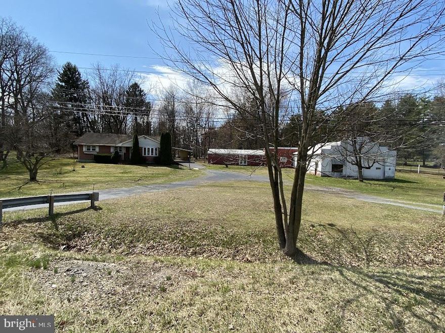 1.8 acre property in Commercial zoning along Route 72. Great opportunity to relocate your business along busy highway and utilize the 1600 SF block garage as well as the additional 1900 SF structure for storage or bring our own ideas. House does need updating and has 2 sump pumps in basement. Property is part of an estate. Please allow ample time for estate to consider and respond to offers