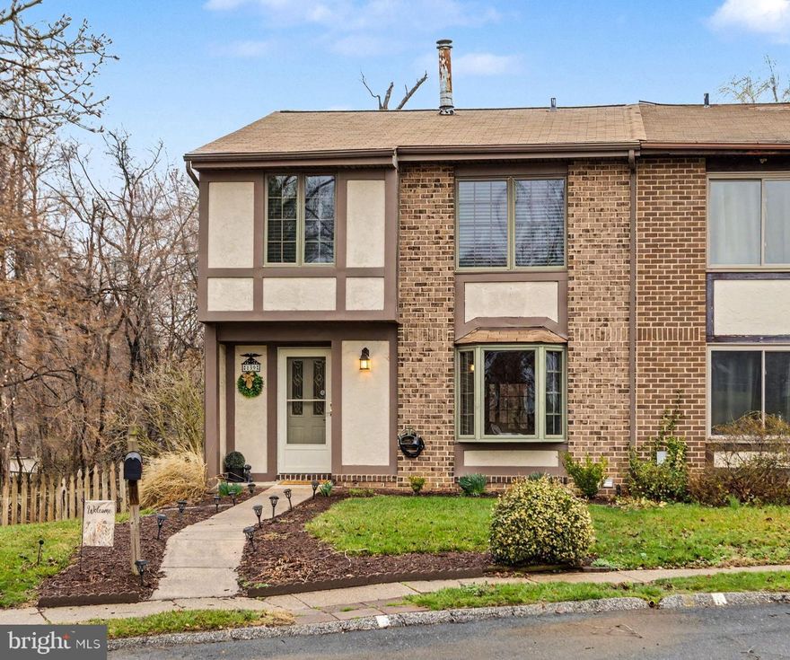 Location! Location! Location! Spacious Tudor-style townhome located off Seven Courts Drive in Perry Hall (Parkville zip code 21234) sits on one of the biggest and best lots in the neighborhood. Inside, you’ll enter a warm living room that flows into a separate dining room, while the updated kitchen with stainless steel appliances, hardwood floors and ample cabinet space is perfect for the chef in the family. Just off the kitchen is a generously sized screened-in porch overlooking a level yard with beautiful views of budding trees and a quiet stream. The primary bedroom features a private bathroom and walk-in closet with barn door, and there are three additional nicely sized bedrooms plus a second full hall bath upstairs. The lower level offers a laundry and storage room and a spacious club room with shiplap walls, barn door, laminate floors, with sliding doors leading to a walk-out patio. Recent updates include a new roof in 2025, hot water heater in 2020. The following updates were done in the lasts 5-7 years: heat and AC, kitchen remodel, sump pump, windows and sliders.