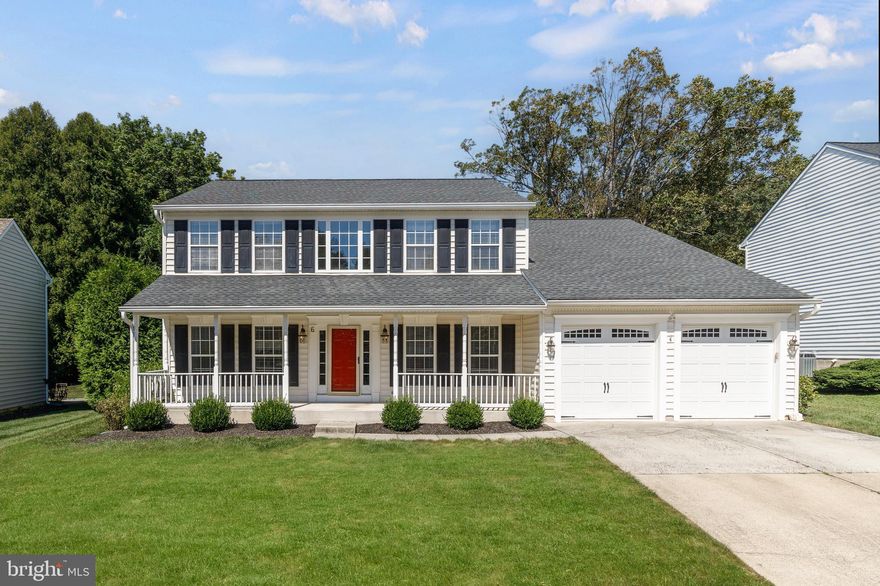 A bright open floor plan welcomes you to this 4 bedroom, 2.5 bath home in sought-after Hunt Valley Station.  Main level is highlighted with gleaming wood floors, an updated kitchen open to family room with wood burning fireplace, formal living room, dining room, office/den and laundry.  The upper level features 4 spacious bedrooms with newer carpet 2023, including a primary suite with attached bath, and renovated hall bath 2023.  Additional updates include roof 2016, hot water heater 2024, dishwasher 2025, and upper level heat pump 2025.  Lower level offers ample space for future expansion or storage.  The private rear yard backs to trees and is perfect for play, entertaining, or simply relaxing with a view!