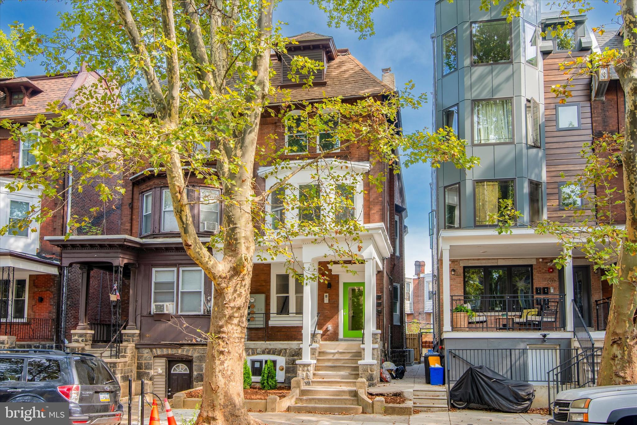 Don't miss this exceptional triplex, every aspect of the building has been meticulously planned to ensure ease and stylish finishes.
Each unit is equipped with energy-efficient mini-split heating and cooling systems, durable yet stylish engineered wood flooring, and a charming whitewashed exposed brick wall. Residents will appreciate the LG front-loading washer and dryer, chic kitchens with Whirlpool stainless steel appliances, quartz countertops, sleek woodgrain cabinetry.
The first-floor unit is a bi-level 3-bedroom, 2-bath apartment, currently rented at $2,125, it offers an eat-in kitchen, two bedrooms, a hall bath, and exclusive access to a spacious backyard. The finished lower level includes a large living area, a second full bath, a laundry closet, and a generously sized bedroom with an en suite bathroom.
The second floor (rented at $1,558) and third floor (rented at $1,750) units are thoughtfully designed 2-bedroom, 2-bath apartments. Both feature open living areas and oversized windows which bring in for ample natural light.
This building is located within walking distance to Malcolm X, Cedar, and Clark Park. The property is also near the vibrant Baltimore Avenue and 52nd Street corridors. The property has the added benefit of a fully approved 10-year tax abatement and being in an opportunity zone.