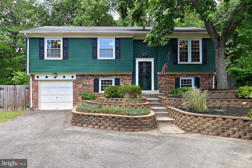 Recently renovated, bright, gorgeous home creates a peaceful oasis. Located on a private pipe stem, this home is nestled in the trees w/lush landscaping, large yard & a newer, spacious $15k deck, perfect for relaxing. New shutters, freshly painted rear exterior, renovated gourmet kitchen, updated baths, new garage door opener, 2011 HVAC, 2012 H2O heater, new paint, new bedroom carpet & much more.