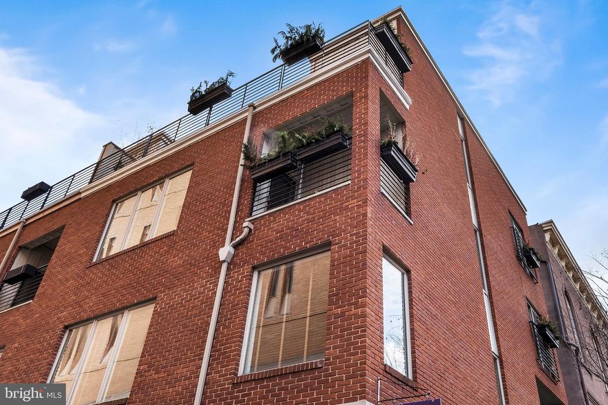 This city home has it all! From its central location in the Washington Square West neighborhood within walking distance to either end of the city, you'll enjoy all the features of Center City living. Park your car(s) in the TWO CAR garage and use the elevator to access all four floors, and you will see why this home is well suited for almost any living situation. From the hardwood floors to the natural stone countertops to the custom flower boxes on each balcony, this home was built with care and attention to detail. The first floor features a den or extra bedroom with a full bathroom and sliders to a private outdoor space. The second level's gracious  formal living room has a gas fireplace; it also has a gorgeous kitchen with fantastic counter space, a new Bosch oven and dishwasher, Viking refrigerator and a breakfast counter that seats at least four. Being conveniently situated next to the dining room, this floor is wonderful for entertaining. The third level is a sumptuous main bedroom suite with a sitting area, two walk-in closets, and a luxurious marble bathroom with a double sink, a large soaking tub with air jets, and a large separate marble stall shower. The fourth floor has a sitting room with a wet bar, two additional bedrooms, a full bathroom and sliding doors to a deck with excellent views of the city skyline. There are four outdoor spaces in this home each floor has its own outdoor space! The owners of this home have thought of just about everything, including an irrigation system for plants, and an alarm system with security cameras and a fire sprinkler system and a central vac. This home is in the McCall School District. Please be sure to click on the 3D Matterport link. There is also a video tour which may be viewed by clicking play in the Matterport.