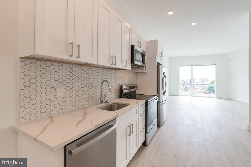 Photo of 1622 Point Breeze Avenue #UNIT 111, PHILADELPHIA, PA 19145 (MLS # PAPH2558604)