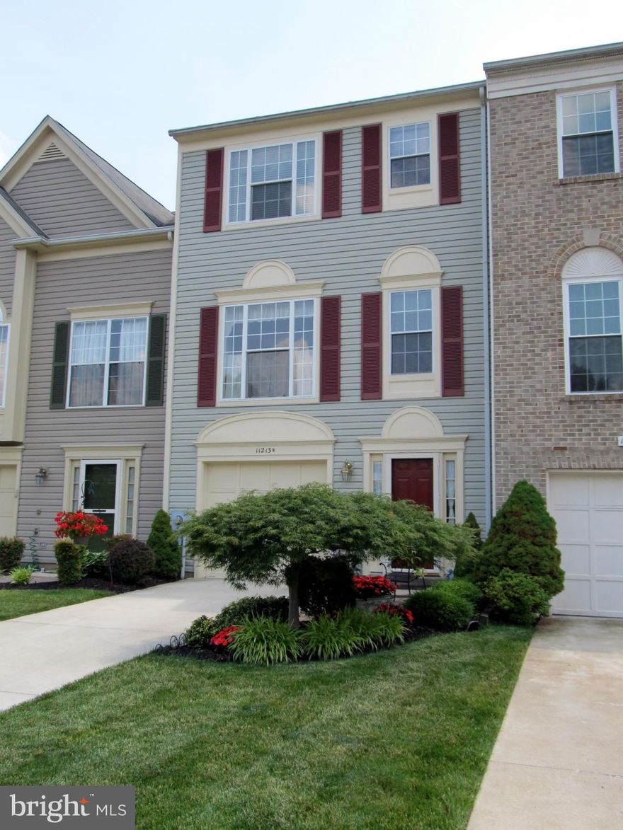 Move in ready!  Original owners.  3 bedroom, 2 full and 2 half baths with 1 car garage.  Open floor plan with large deck.  Lower level boasts hardwood foyer, half bath and family room with walkout to patio.  Master suite with large bath with dual sinks, sep shower and soaking tub.  Located within walking distance to shopping and restaurants.