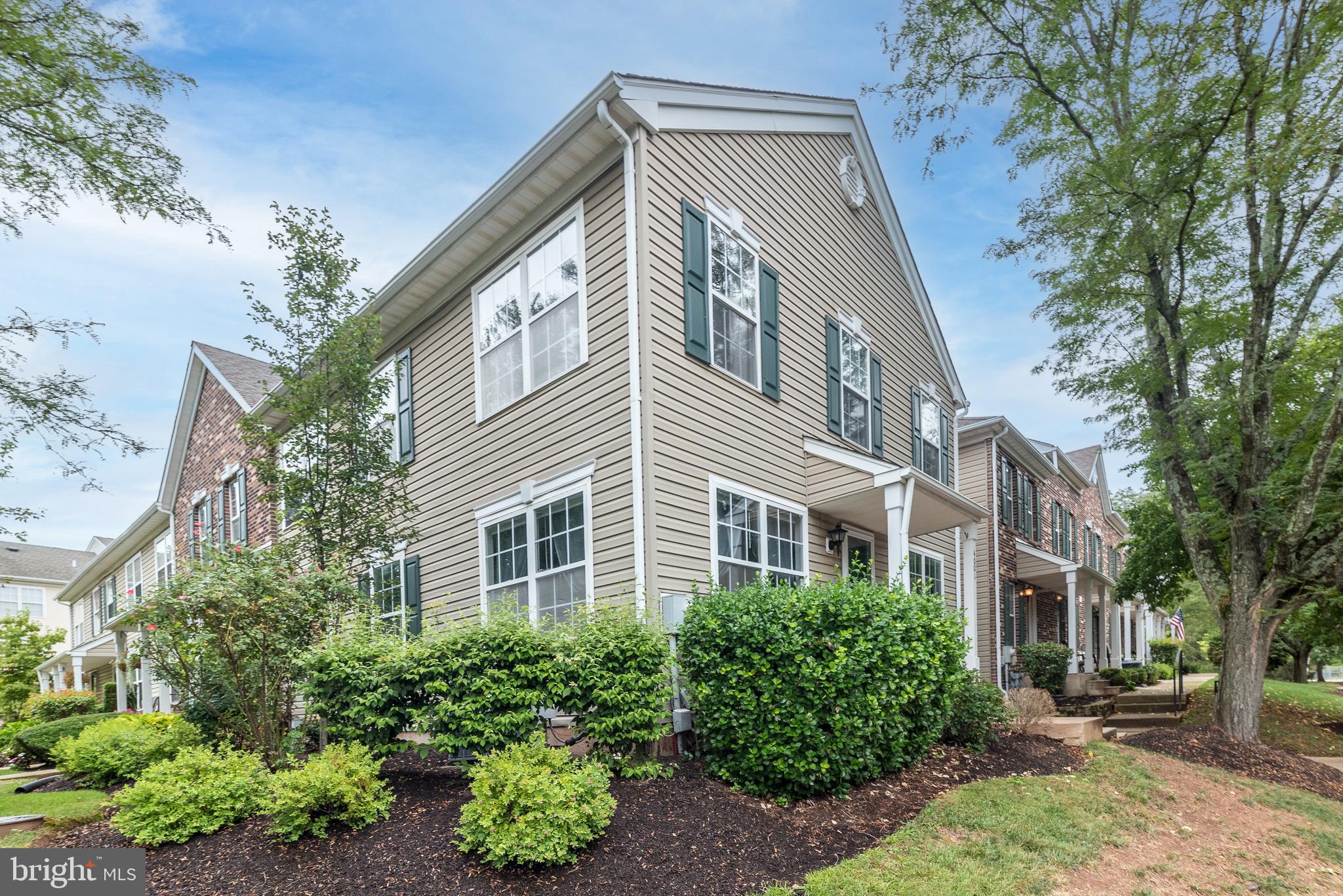 **SELLER REQUESTS ALL OFFERS TO BE SUBMITTED BY 1 P.M., TUESDAY, AUGUST 26TH WITH A RESPONSE BY WEDNESDAY, AUGUST 27TH .
Welcome Home to this wonderfully updated 2 bedroom, 1.5 bath END Unit Condo in much sought after community of Patriot's Ridge! Beautifully updated complete with a full finished basement, this home has instant curb appeal with its' Colonial Style Exterior featuring a Portico Covered Entrance and Front Porch. As you enter, you'll immediately take notice of the gleaming Pergo laminate flooring that stretches as far as the eye can see - through the living room, dining room, powder room and kitchen! The main level of this home features a spacious living room with oversized windows that allow for plenty of natural sunlight. The open floor plan offers roominess to entertain guests, watch your favorite program of just kick back and relax. Adjacent to the living room is the Dining Room , a versatile space where you can enjoy a casual meal just for two or a larger gathering of family and friends. The Dining Room is highlighted by a handsome bronze finished light fixture and large windows. The Dining Room flows seamlessly into the Kitchen . The Kitchen features a Bosch Gas Stove, newer Dishwasher, Stainless Steel Sink with Garbage Disposal and recessed lighting. A powder room, recently remodeled, is just off the main living room and completes the living space on the first floor. As you head to the second floor, you'll notice the brand new carpeting. The well-appointed Master Bedroom features two large closets, a sitting/dressing area, and a private entrance into the beautifully newly remodeled Hall Bath! The Second bedroom is nicely sized and is accented by a large walk-in closet and ceiling fan. In addition to the first and second level living space, this property also has a large, finished basement which offers a great space to gather with family and friends and a built-in bar! Additionally there's a large storage space for all your favorite things! The exterior of the property also features an adjacent, common area, park-like setting complete with shady trees, pergolas, and sitting benches highlighted by well-maintained landscaping. If you're looking for a fantastic location, with easy access to major roads and close to commuter routes to Philadelphia, NJ and NYC and yet a short distance to major shopping and dining in Doylestown Boro, make your appointment today. Note: Association takes care of common area maintenance, lawn maintenance, trash removal, and snow removal.