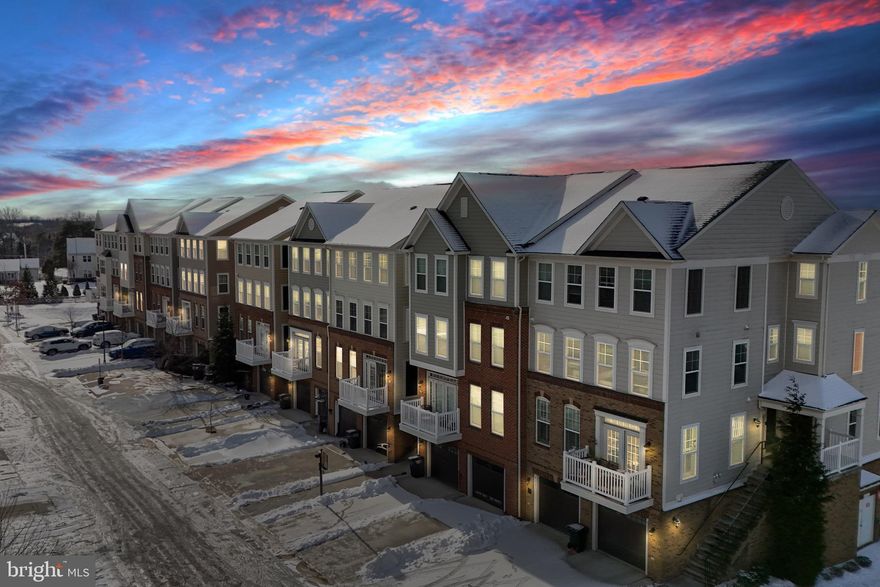 Step into a world of elegance and comfort with this meticulously maintained 4-story townhouse, offering breathtaking mountain views and a lifestyle that blends luxury with convenience. From the moment you walk through the door, the home’s thoughtful design and attention to detail will captivate you.

The main level features gleaming wood floors and an open layout that invites natural light to dance through the space. The gourmet kitchen is a chef’s dream, boasting granite countertops, a gas stove, and ample storage. Whether preparing a quiet meal or entertaining guests, this space is as functional as it is stunning.

Retreat upstairs to the primary suite, where a tray ceiling adds a touch of sophistication. The en-suite bath feels like your own private spa, complete with a double vanity, a standing shower, and a soaking tub, perfect for unwinding at the end of the day. A spacious walk-in closet completes the suite, offering plenty of storage.

This home’s appeal doesn’t stop there. The one-car garage provides convenience, while the wetlands and mountain views create a serene backdrop for daily living. Community amenities include a pool, clubhouse, and nearby parks, perfect for recreation and relaxation.

Located just minutes from shopping, dining, and entertainment at South Riding Market Square and Dulles Landing, this home is perfectly positioned for modern living. Enjoy easy access to major commuter routes like Route 50 and Route 28, ensuring you're never far from where you need to be. For relaxation and wellness, King Spa at East Gate Marketplace offers an indulgent escape with saunas, pools, and rejuvenating treatments just a short drive away. If you're looking for entertainment, Freedom Theater at 25450 Riding Center Drive, Chantilly, VA 20152 showcases live performances and community productions, bringing arts and culture right to your doorstep.
Don’t miss the opportunity to own this elegant home, where every day feels like a retreat. Schedule your tour today and experience the beauty for yourself!