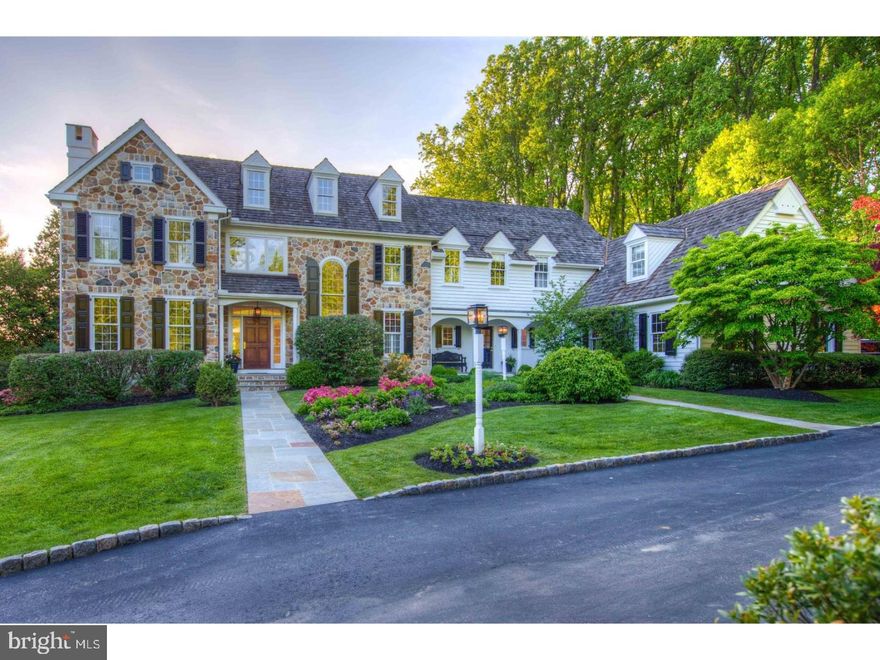 STUNNING....is the one way to describe this magnificent home and property with a storybook setting capturing views of Ardrossan. This custom masterpiece was creatively designed and built to be one with nature surrounded by 2+ acres, lavish perinneal gardens and mature landscaping creating a magical private oasis. This one-of-a kind gem has exceptional features and finishes, and an open floor plan making it a architecturally special and unique. Elegance abounds, as you enter the two story Foyer flooded with natural sunlight front to back as it gracefully flows  into the Living and Dining Rooms. These inviting rooms are further complemented as they open to a magnificent covered Porch providing outside living space to be enjoyed year round. Additionally, off of the Foyer is a recently restyled Library with lacquered cabinetry and gas fireplace providing a private retreat. But the most recent renovations of this spectactural home can be found in the "family hub" as the Kitchen, Breakfast Area, and Great Room have been transformed to seamlessly blend together creating spaces to be enjoyed on a daily basis and as an entertainers dream. The gourmet Kitchen is a chefs delight featuring a Thermador commercial range, farmhouse sink, quartzite island, warming tray, beverage refrigerator drawers, wine refrigerator and so much more. Gleaming Hardwood floors carry you into the Breakfast Area with custom built table and banquette for seating up to 15, into the spectacular Great Room with soaring ceilings, wood burning fireplace and built-ins. These three rooms open to an expansive flagstone patio with knee walls that overlook the property's breathing backyard and pool. The First Floor is completed by a Mudroom with access to the 3 car Garage and informal and formal Powder Rooms. A gracious staircase with exceptional millwork leads you to the Second Floor where a lovely Master Suite awaits with Bath, walk-in closets and the most picturesque views perfect to begin and end your day. There are Two additional Bedrooms and a Hall Bath with a Fourth en-suite Bedroom and Bath. The Fifth very large Bedroom is its own private retreat with bath over the garage. The Lower Level is finished and has a Full Bath. Don't miss this amazing home and property where you will always feel like you are on vacation, in The Gold Coast of Radnor Township!!