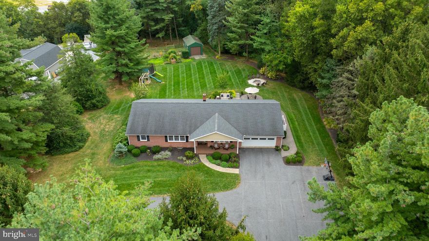 Experience an elevated standard of living in beautiful Lititz, PA!
Nestled on 2+ acres of stunning grounds, this beautifully renovated home offers a wonderful blend of modern luxury and natural serenity. From the moment you step inside, you’ll love the tasteful flow of the home, with hardwood floors and upgrades throughout. Oversized windows in the living room create a warm and inviting atmosphere and open to the views beyond. The kitchen is a delightful space with a spacious island, upgraded appliances, and lots of storage. Just outside the kitchen there's a beautiful patio perfect for morning breakfasts, and overlooking the beautiful grounds. Off the living area you'll find three bedrooms on the main floors, as well as a spacious bathroom. Continuing through the main floor, you'll find the laundry facilities and half bath next to the spacious 2 car garage. In the lower level you'll find another bedroom, spacious and well appointed. The lower level functions nicely as a large, secondary living area, and provides a pleasant, versatile space for whatever your needs may be.
All this is in a gorgeous location, minutes from Bent Creek Country Club, and a short drive from Lititz, Lancaster, and so much more.
Renovations throughout in the last few years make this a home ready to be enjoyed for a long time to come, with a newer roof, newer AC, upgraded kitchen and baths and so much more. Don't miss the opportunity to make this amazing home yours!