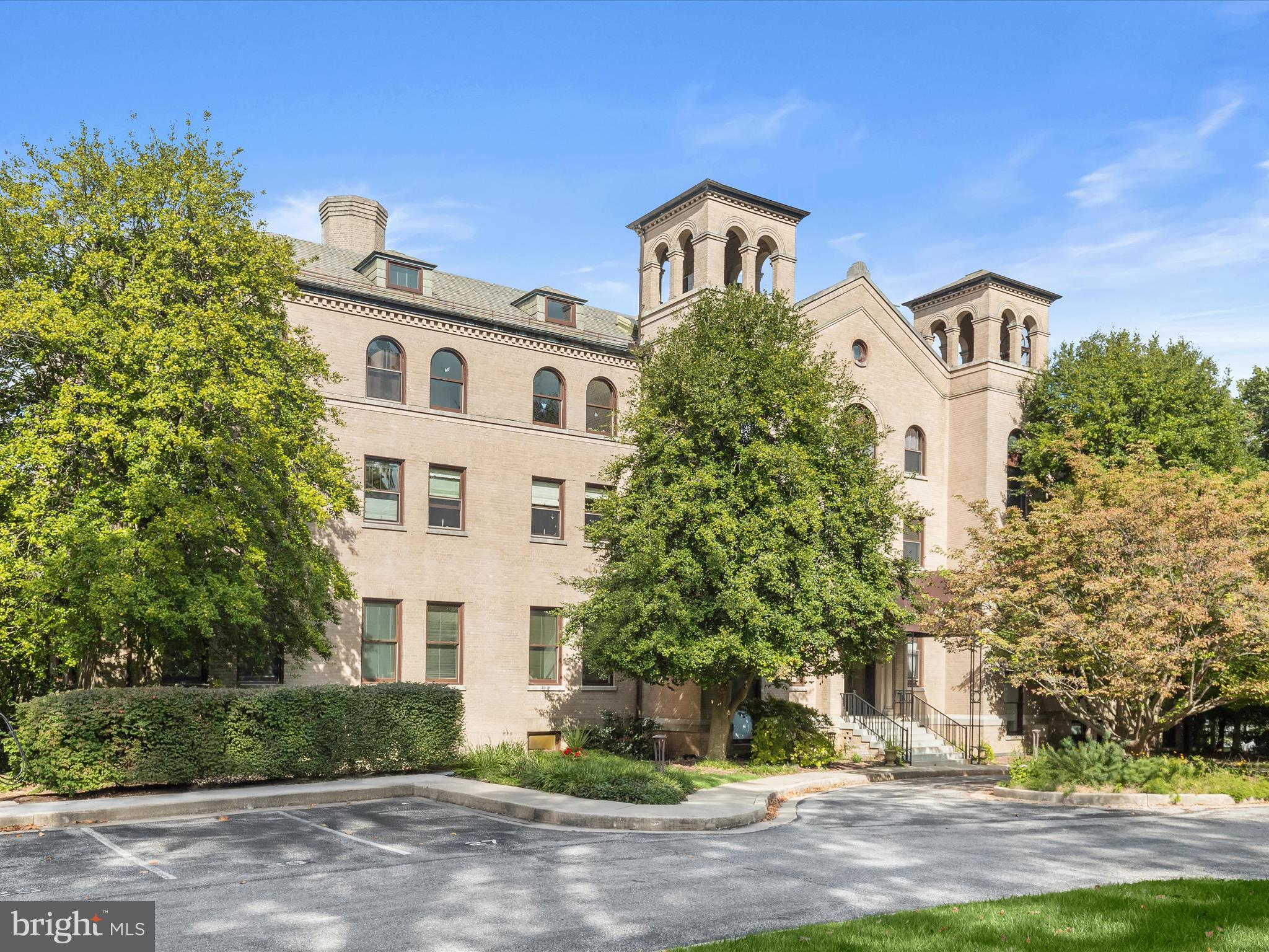 Nestled in the charming Roland Park community, this delightful 2-bedroom, 2-bathroom apartment in The Bellemore offers a perfect blend of classic elegance and modern convenience. Built in 1925, this traditional brick unit features a warm and inviting atmosphere, enhanced by crown moldings and beautiful wood floors throughout. Step inside to discover a spacious open floor plan that seamlessly combines the dining and living areas, ideal for entertaining or cozy evenings at home. The gourmet kitchen is a chef's dream, equipped with stainless steel appliances, upgraded granite countertops, and a built-in microwave, making meal preparation a joy. Enjoy the convenience of a main floor laundry area with stacking Bosch washer & dryer, ensuring that chores are a breeze. Retreat to the primary suite, complete with a luxurious en-suite bath and a generous walk-in closet, providing ample storage for your wardrobe. The second bedroom is perfect for guests or a home office, offering flexibility to suit your lifestyle. Outside, relax on your private patio, surrounded by beautifully maintained common grounds. The building offers additional amenities, including extra storage and an elevator for easy access. With an association fee that covers essential services like lawn maintenance, snow removal, and custodial services, you can enjoy a low-maintenance lifestyle. Conveniently located near public transportation and local amenities, this home is a true gem waiting for you to make it your own. Experience the comfort and charm of The Bellemore today!
Note: Select interior photos have been virtually staged.
