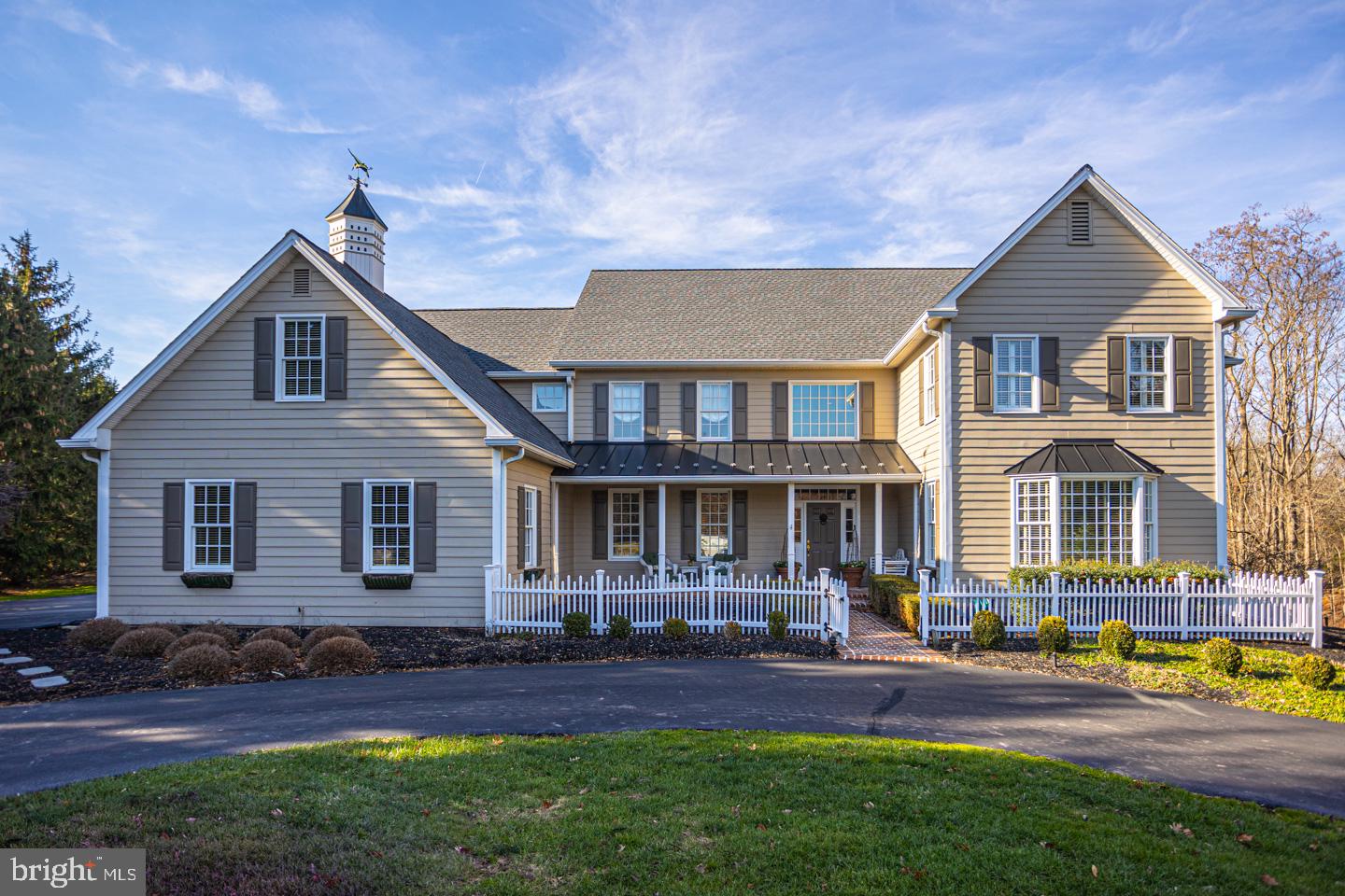 Welcome to 7 Sprucefield Court an exceptionally charming home nestled at the end of a cul de sac in a small enclave of homes. Enjoy the stunning curb appeal leading to the quaint brick walkway and porch in this exquisitely maintained Ferman Lex colonial. Beautifully appointed and classic throughout, this stunning home offers a fantastic flow and enough flex space for everyone to work from home! The formal living room with fireplace flows effortlessly to a light filled dining room, which conveniently leads to the heart of this home, its spacious kitchen. Granite countertops grace the large L shaped island and are complemented by raised panel cabinetry. A paneled SubZero refrigerator and high-end stainless steel appliances create a space that is wonderful to cook in and a pleasure to dine in. Enjoy your morning coffee in the breakfast area with French doors overlooking the brick patio and wooded backdrop of the rear yard. Enjoy cozy nights around the wood burning fireplace in the expansive gathering room with a wall of windows that allow for a natural view of the Bucks County landscape. A den provides additional living space or can be used as a home office. A quaint screened in sunroom is the perfect place for either hosting guests or relaxing while taking in your peaceful surroundings. Stylish, neutral colors throughout the home radiates tranquility. Completing the main floor are two half baths, convenient drop zone, an oversized mud/laundry room and plenty of closets! The second floor features a main suite boasting a tray ceiling, sitting room and a large walk-in closet with island and professional organizers. Pamper yourself in the luxurious main bath featuring dual vanities, Jacuzzi tub and stall shower. Two spacious bedrooms share a Jack and Jill bath and the fourth bedroom has it’s own private bath. Architectural details like dentil crown molding, finished in place hardwood floors, aluminum wrapped windows and custom cabinetry enhance the entire home. The walk out lower level is unfinished but has roughed-in plumbing for a bath offering endless possibilities and wonderful storage. Additional home amenities include a central vacuum system, home generator, sprinkler system in garden beds, Hardi plank siding and 3 car side entry garage with epoxy flooring. All of this in Solebury Township, minutes away from New Hope Boro and in the award-winning New Hope Solebury School District. A magnificent opportunity!
