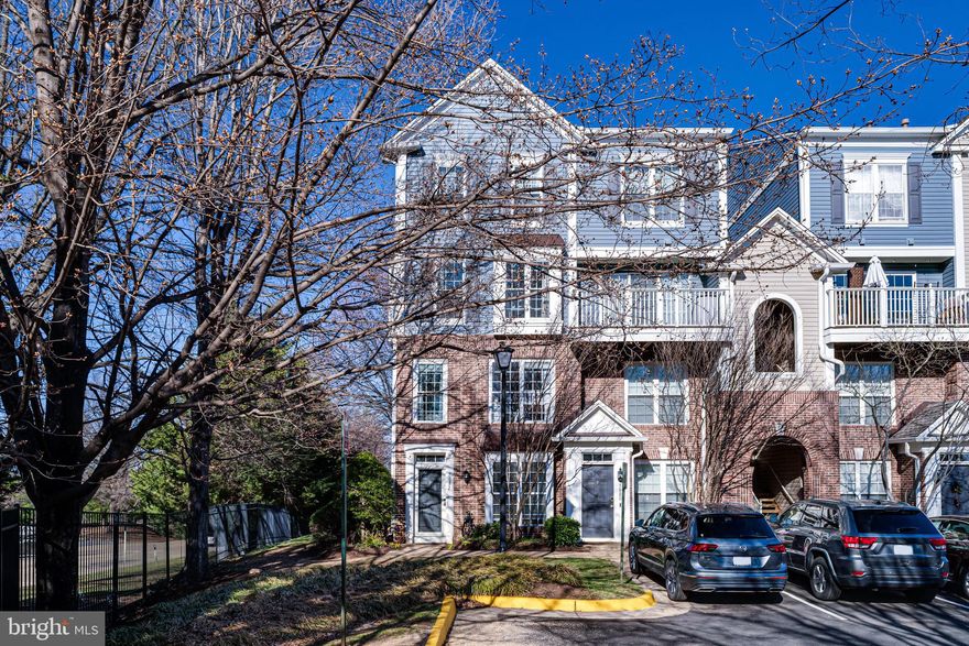 Offer Deadline Notice – Monday, March 24th at 12:00 PM
Welcome to 7082 Falls Reach Drive, an exceptional end-unit townhouse-style condo in the heart of West Falls Church, where natural light, modern comfort, and unbeatable convenience come together seamlessly. This spacious 2-bedroom, 2.5-bathroom home is designed for effortless living, featuring expansive windows that flood the space with sunlight, soaring 9-ft ceilings, and a cozy gas fireplace that adds warmth and character. The kitchen is beautifully updated with sleek countertops, stainless steel appliances, and ample cabinetry, perfect for both everyday living and entertaining. Upstairs, the primary bedroom retreat offers a private balcony, a generous walk-in closet, and an en-suite bath with a luxurious soaking tub and separate shower, while the second bedroom boasts its own private full bath for ultimate convenience. Step outside to a private patio for a quiet escape or seamless indoor-outdoor entertaining.  

Location is everything, and this home delivers. Walk to the West Falls Church Metro for an effortless commute, and enjoy quick access to I-66, I-495, and Route 7, placing DC, Arlington, and Tysons just minutes away. This prime Falls Church location offers endless options for dining, shopping, and entertainment, with sought-after conveniences like grocery stores, coffee shops, parks, and the W&OD Trail all within walking distance. Plus, the vibrant Mosaic District and Tysons Corner are just a short drive away. Residents also enjoy access to a community pool, ample guest parking, and the sought-after Haycock/Longfellow/McLean school pyramid.  

Don’t miss this opportunity to own a light-filled, move-in-ready home in a highly sought-after Falls Church community. With its inviting charm, modern updates, and unbeatable location, this home offers the perfect blend of comfort and convenience. Schedule your private showing today and experience the warmth and ease of townhouse-style living just steps from it all!