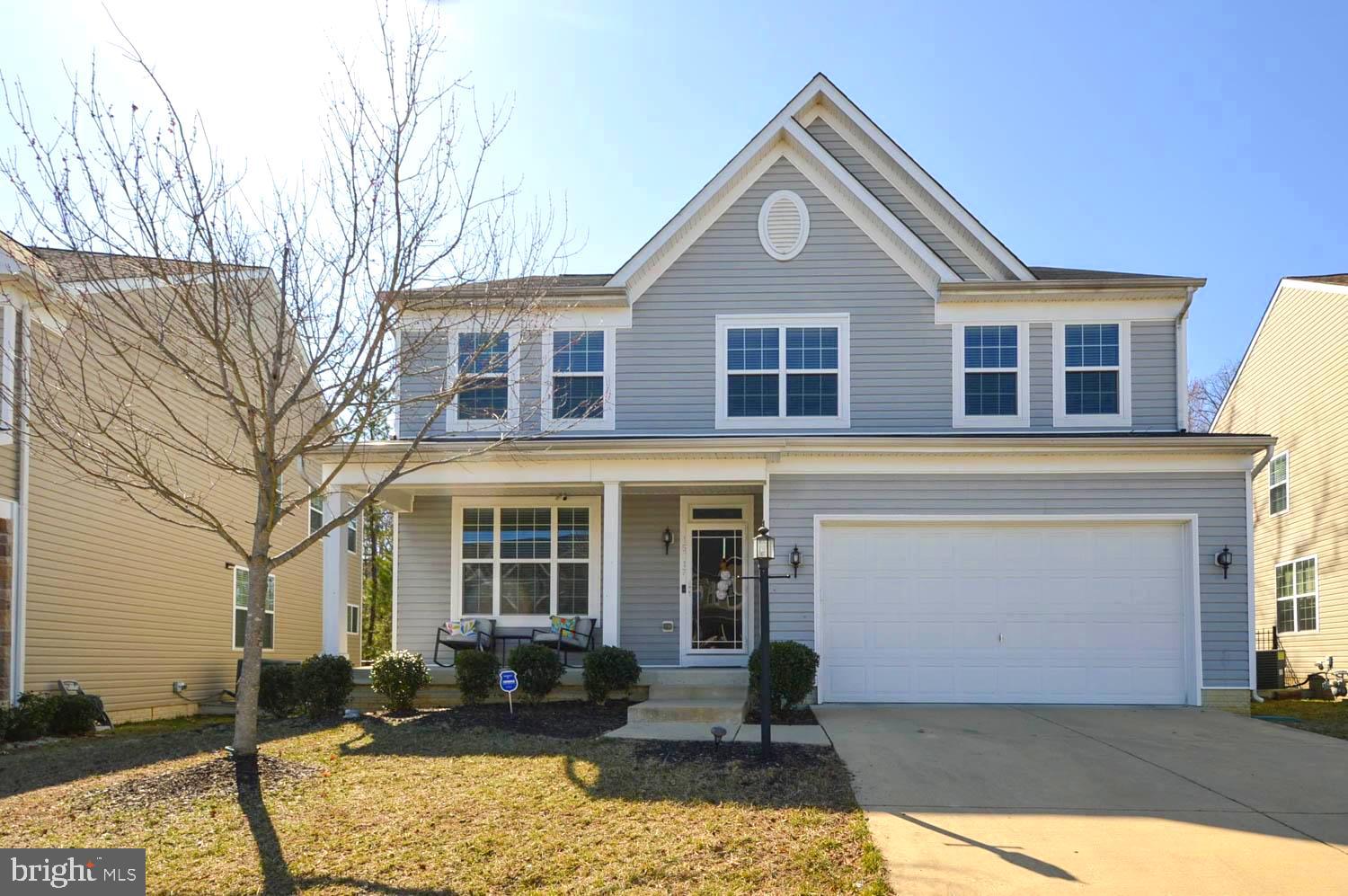 Wonderful, Beautiful and Spacious Move in Ready Home. This Well Maintained 4/5 Bedroom, 3.5 Bathroom House is Located in a Great Planned Community Complete with Walking Trails, Swimming Pool, Community Center and Fishing Pond with Fountain. The House has an Open Floor Plan which makes the House Idea for Entertaining. Fully Equipped Stainless Steel Kitchen with Granite Countertops and a Kitchen Bar Large Enough to Accommodate 4-5 People. The Family Room is Tucked in the Rear with a Cozy Gas Fireplace. A Separate Dining Room, Eat in Kitchen and Laundry Room are also Located on the Main Level. Upstairs has an Oversized Owners Suite with a Huge Walk-in Closet and Luxury Bath with Separate Soaking Tub and Shower. Also, there are 3 Other Spacious Bedrooms and 1 Bathroom . The Upper Level Also has a BONUS Family Room! It could be Configured as a Library, Study Area or Game Room. The Basement is Ready for Entertaining! The Gorgeous Built in Wet Bar will be the Focal Point of many Super Bowls or Karaoke nights! Basement also has a Bedroom/Den. The Tree Conservation to the Rear of the Home provides a Private Setting for Relaxing or Entertaining. The Deck, Huge Stone Patio and the Pergola will Provide Years of Enjoyment.
Bonus! Bonus! 3 CAR GARAGE!!!
Convenient Location to ALL YOUR NEEDS. Within 5 Minutes: Gas Station, Target, Costco, Movie Theater, Safeway, Chick-Fil-A, Bonefish Grill and so much more. Perfect!